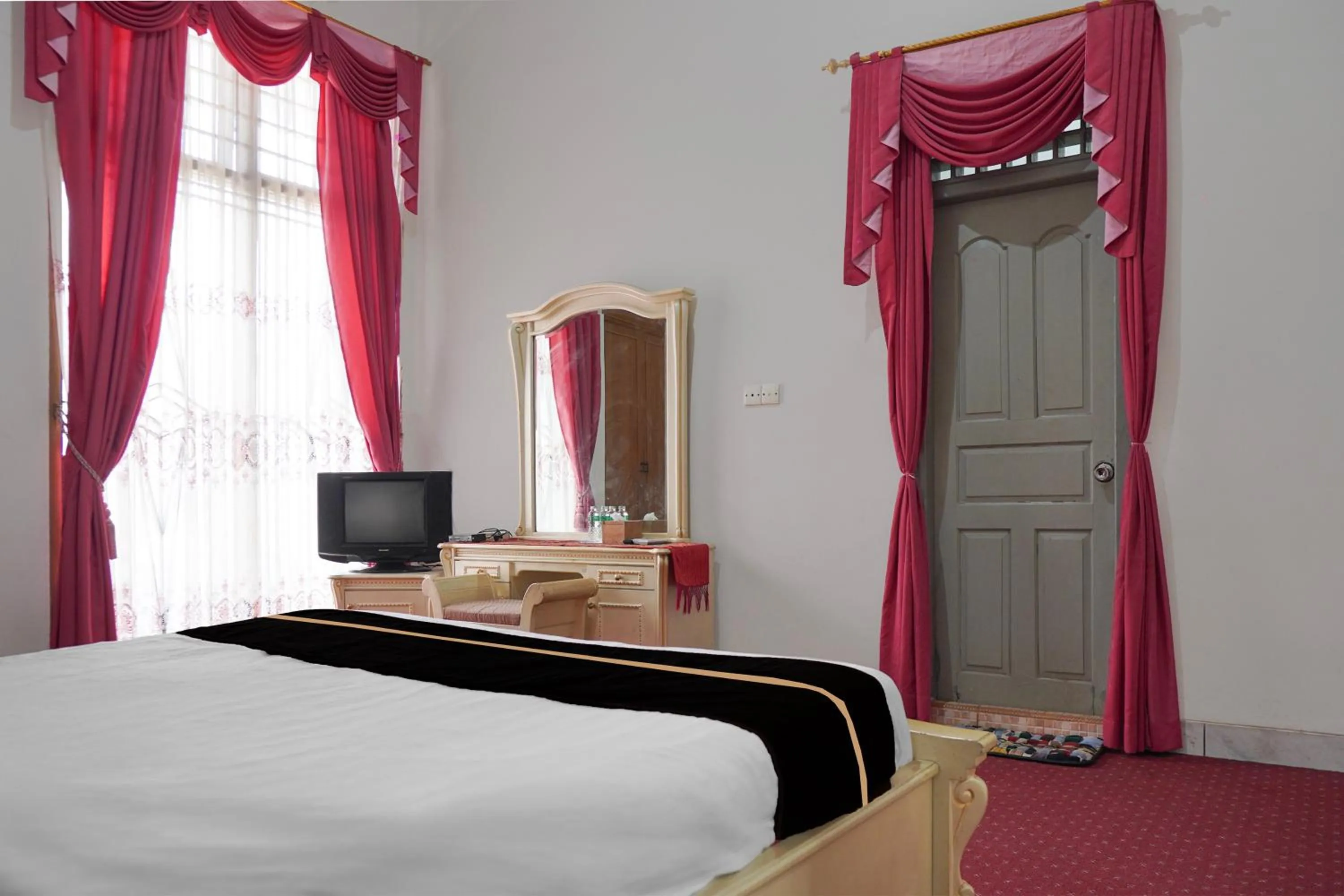 Bedroom, Bed in Collection O near Universitas Negeri Padang formerly Hotel Amra