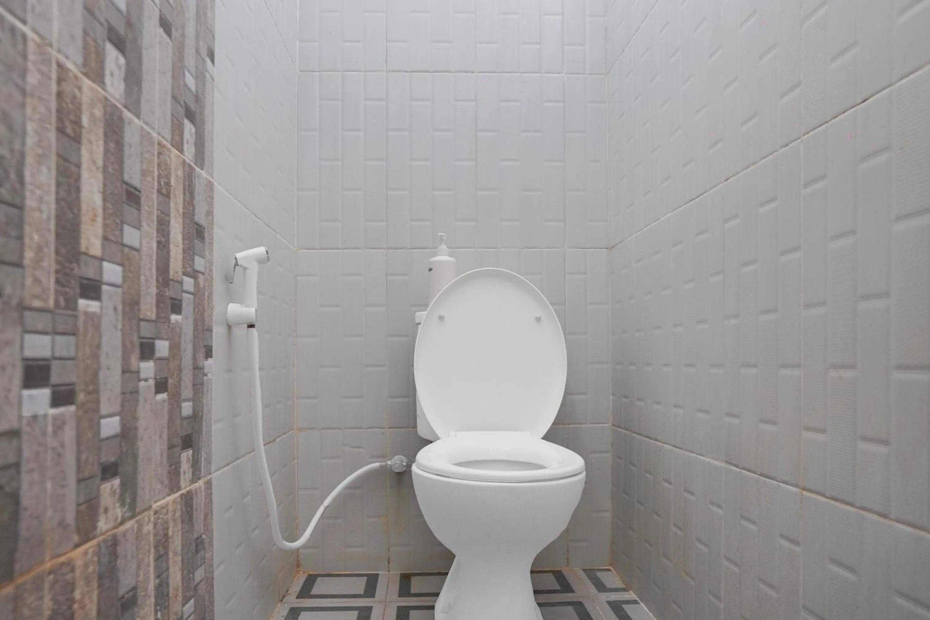 Bathroom in Collection O near Universitas Negeri Padang formerly Hotel Amra