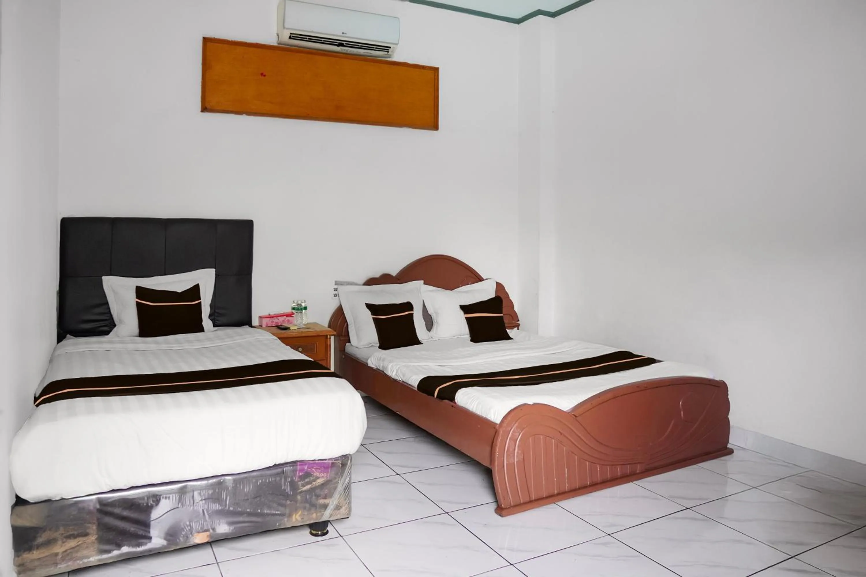 Bedroom, Bed in Collection O near Universitas Negeri Padang formerly Hotel Amra