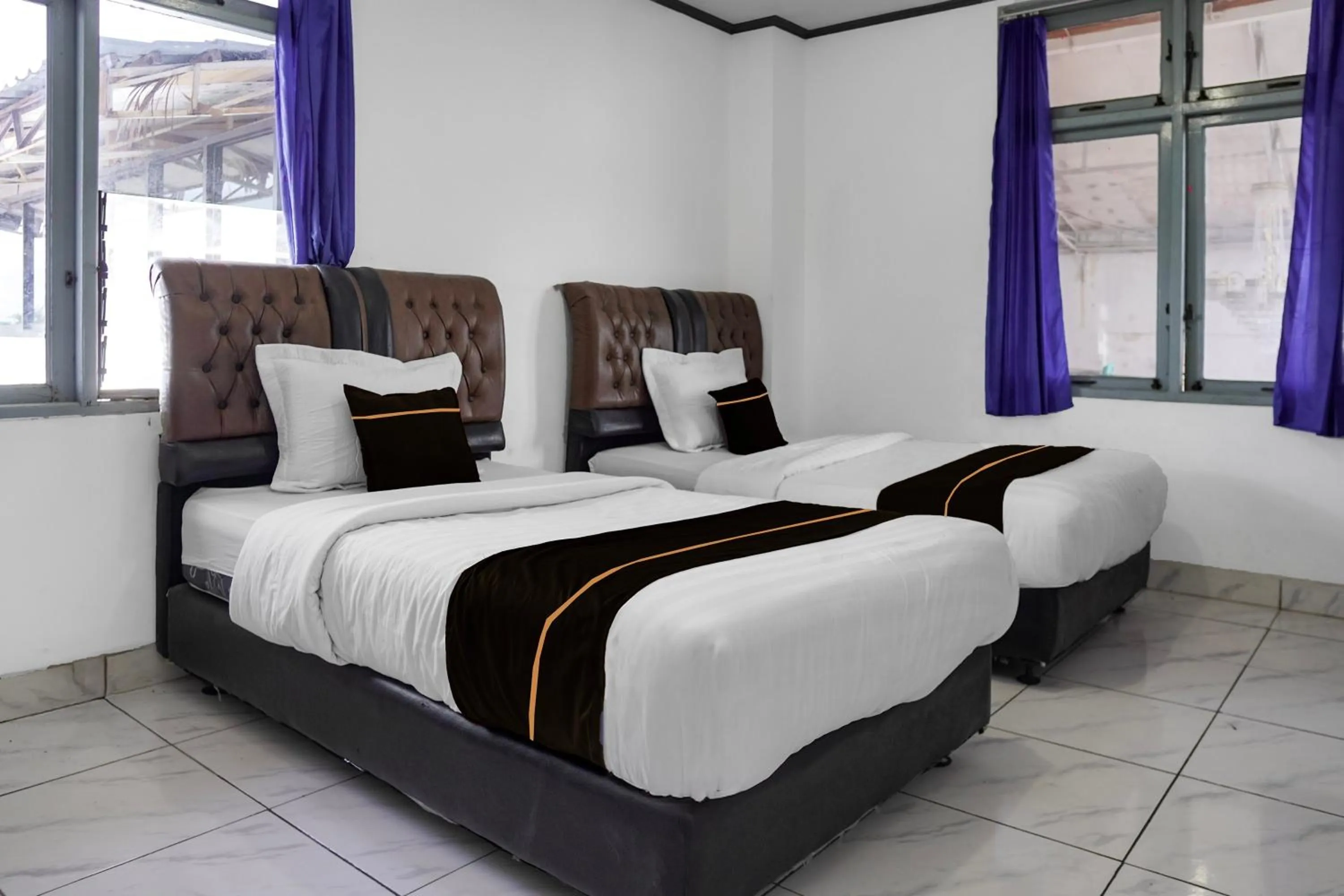 Bedroom, Bed in Collection O near Universitas Negeri Padang formerly Hotel Amra