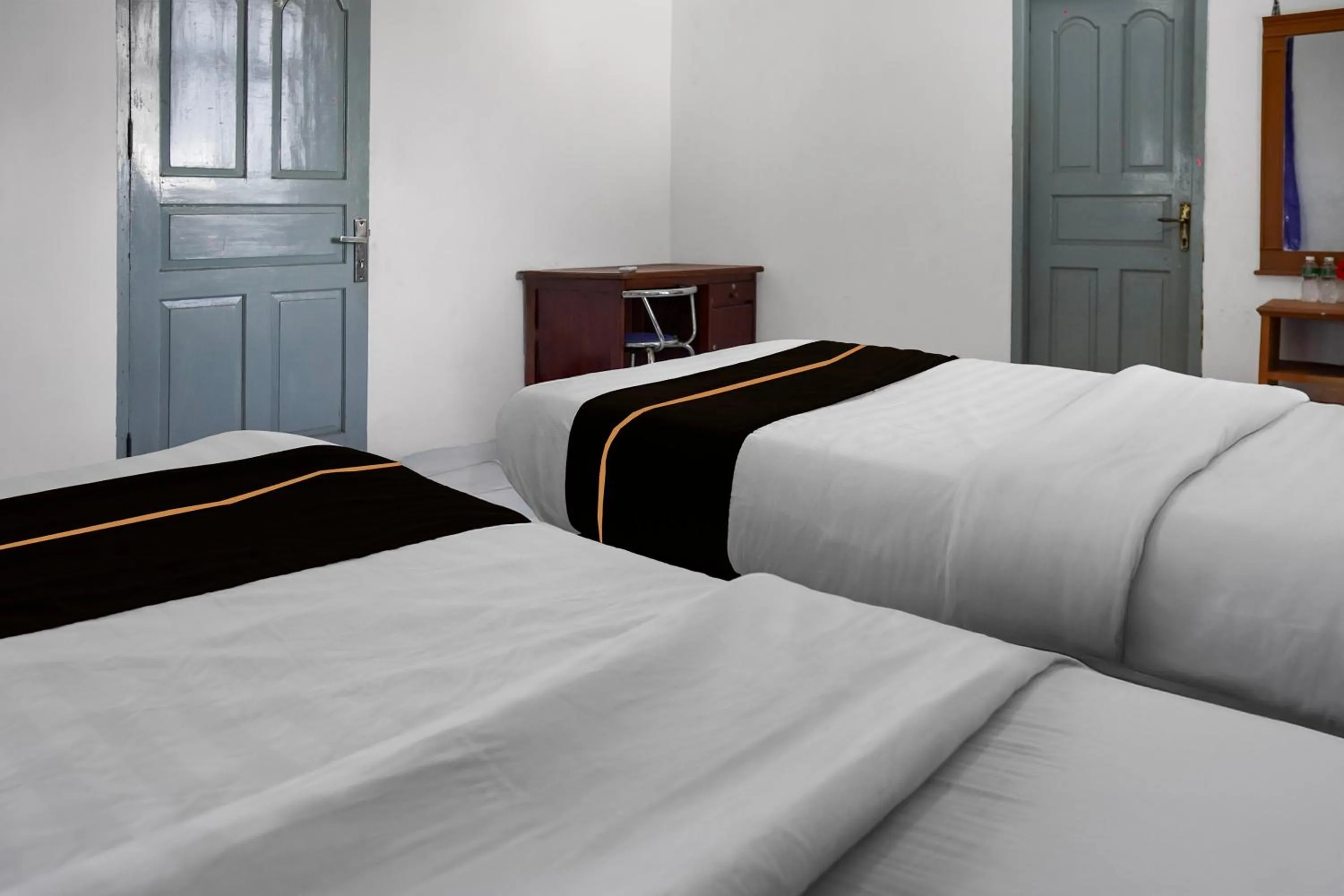 Bedroom, Bed in Collection O near Universitas Negeri Padang formerly Hotel Amra