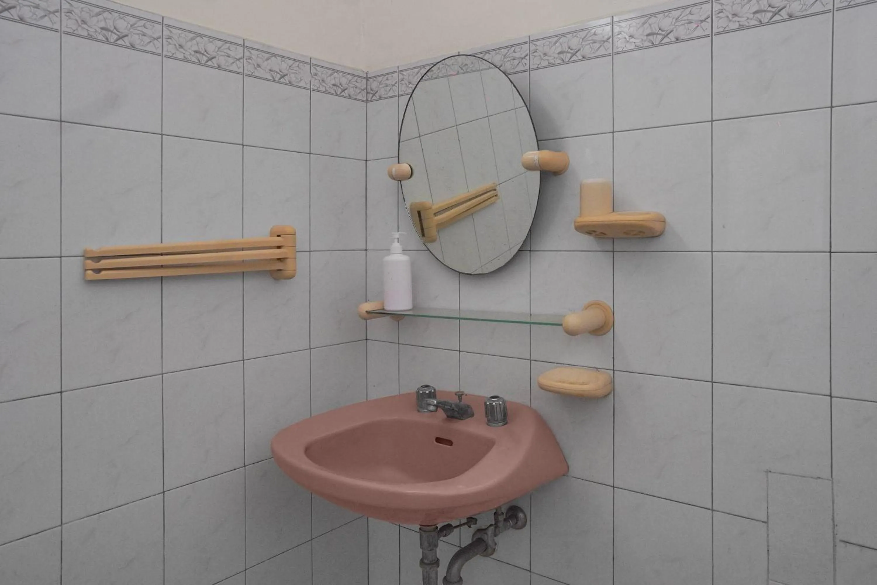 Bathroom in Collection O near Universitas Negeri Padang formerly Hotel Amra