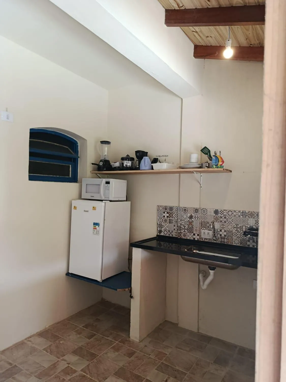 Kitchen or kitchenette in Apartamentos Canoeiro