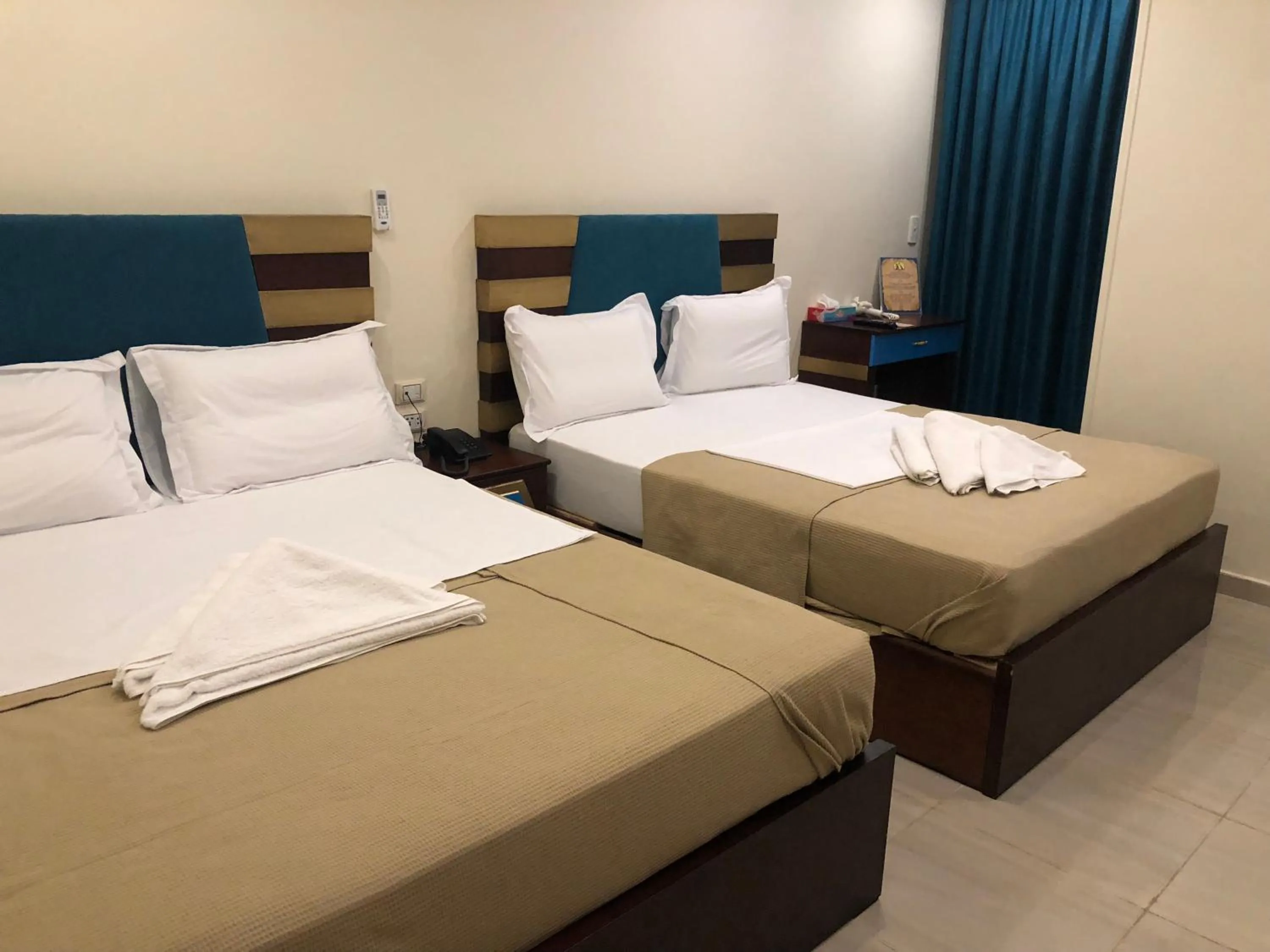 Photo of the whole room, Bed in Great Pyramid Inn