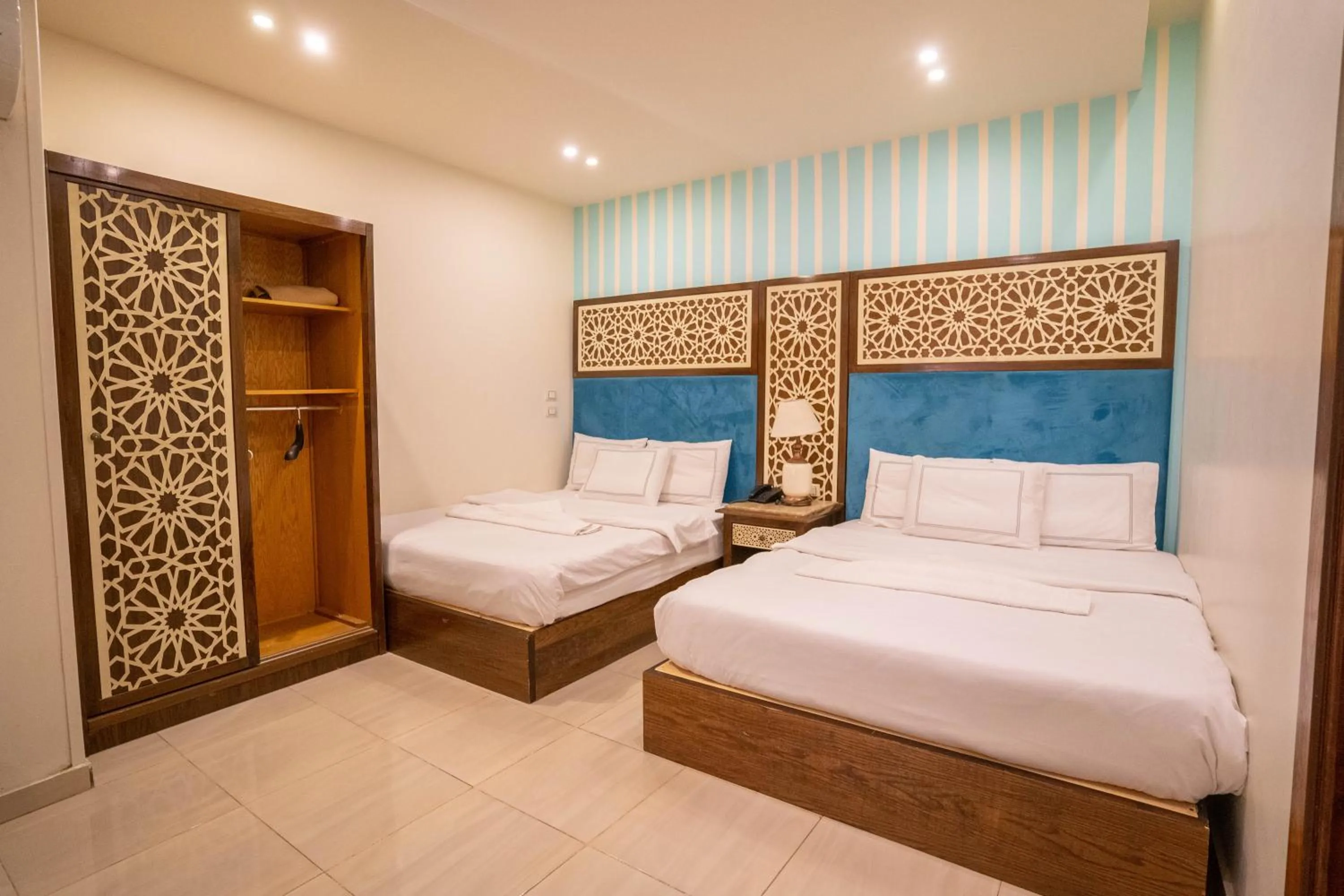 Bed in Great Pyramid Inn