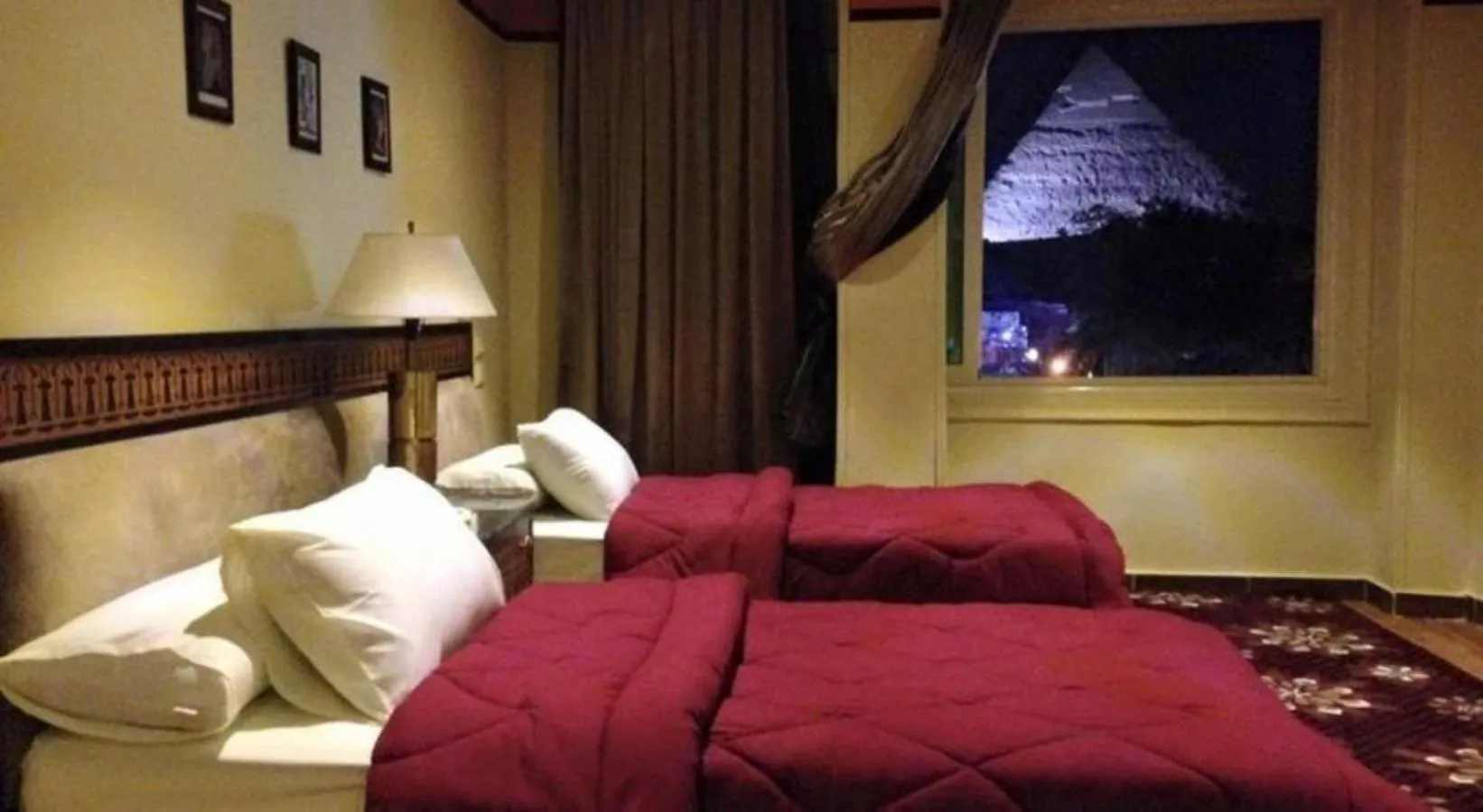 Photo of the whole room, Bed in Great Pyramid Inn