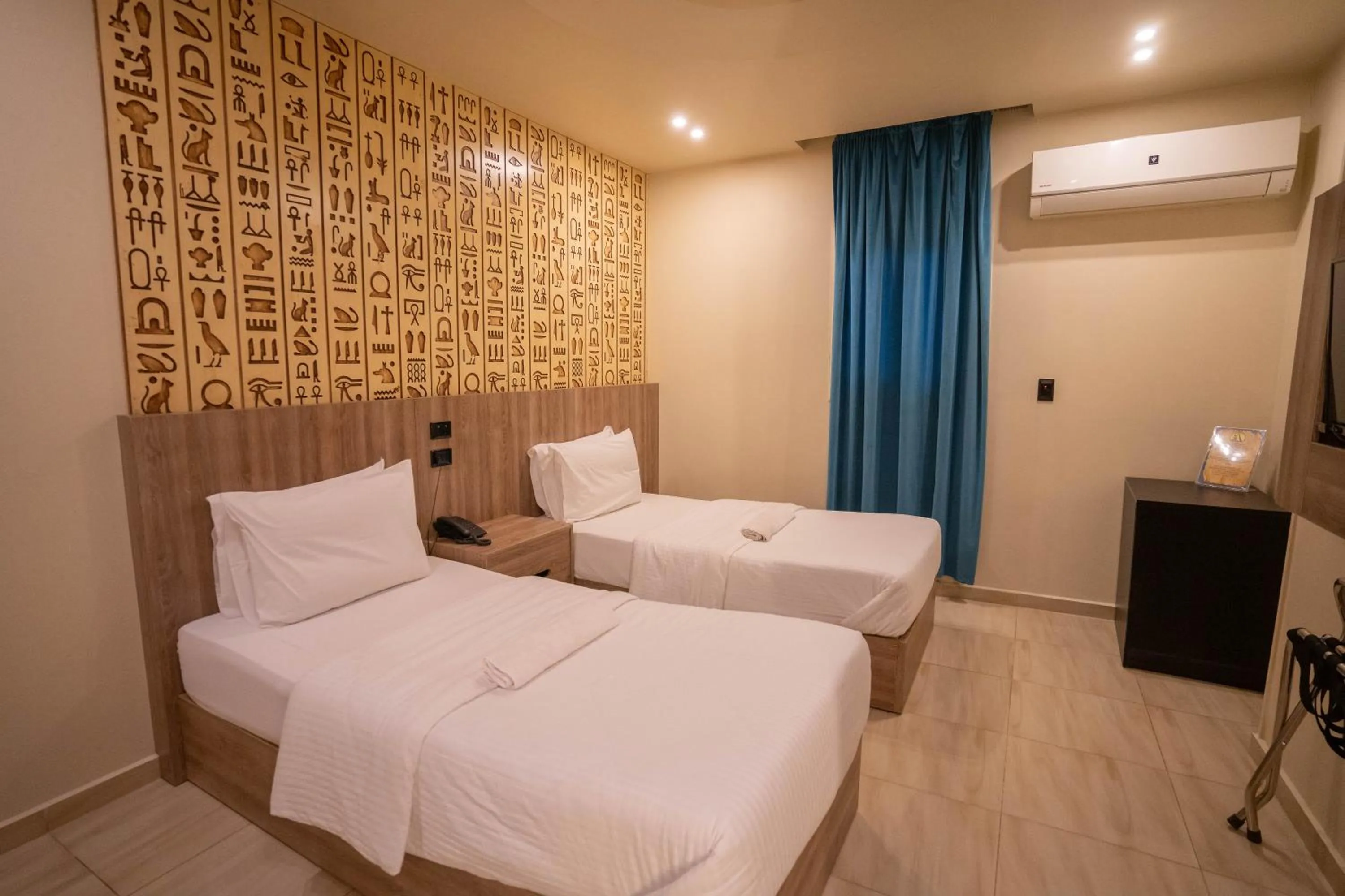 Bed in Great Pyramid Inn