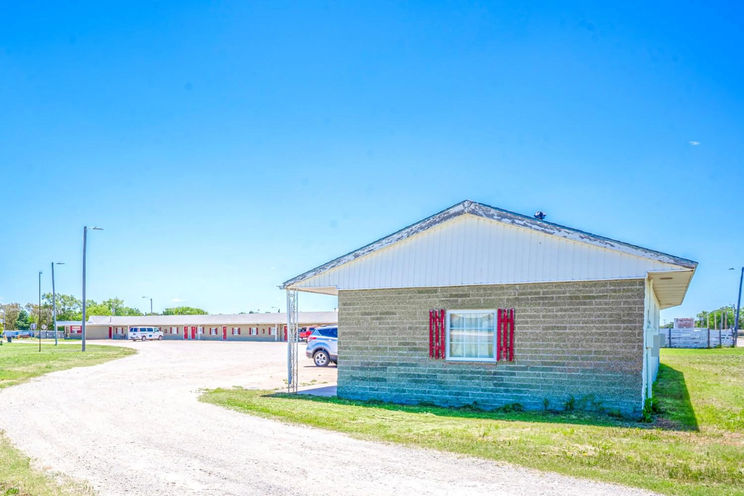 Facade/entrance in Green Acre Motel by OYO Near Rush County Airport