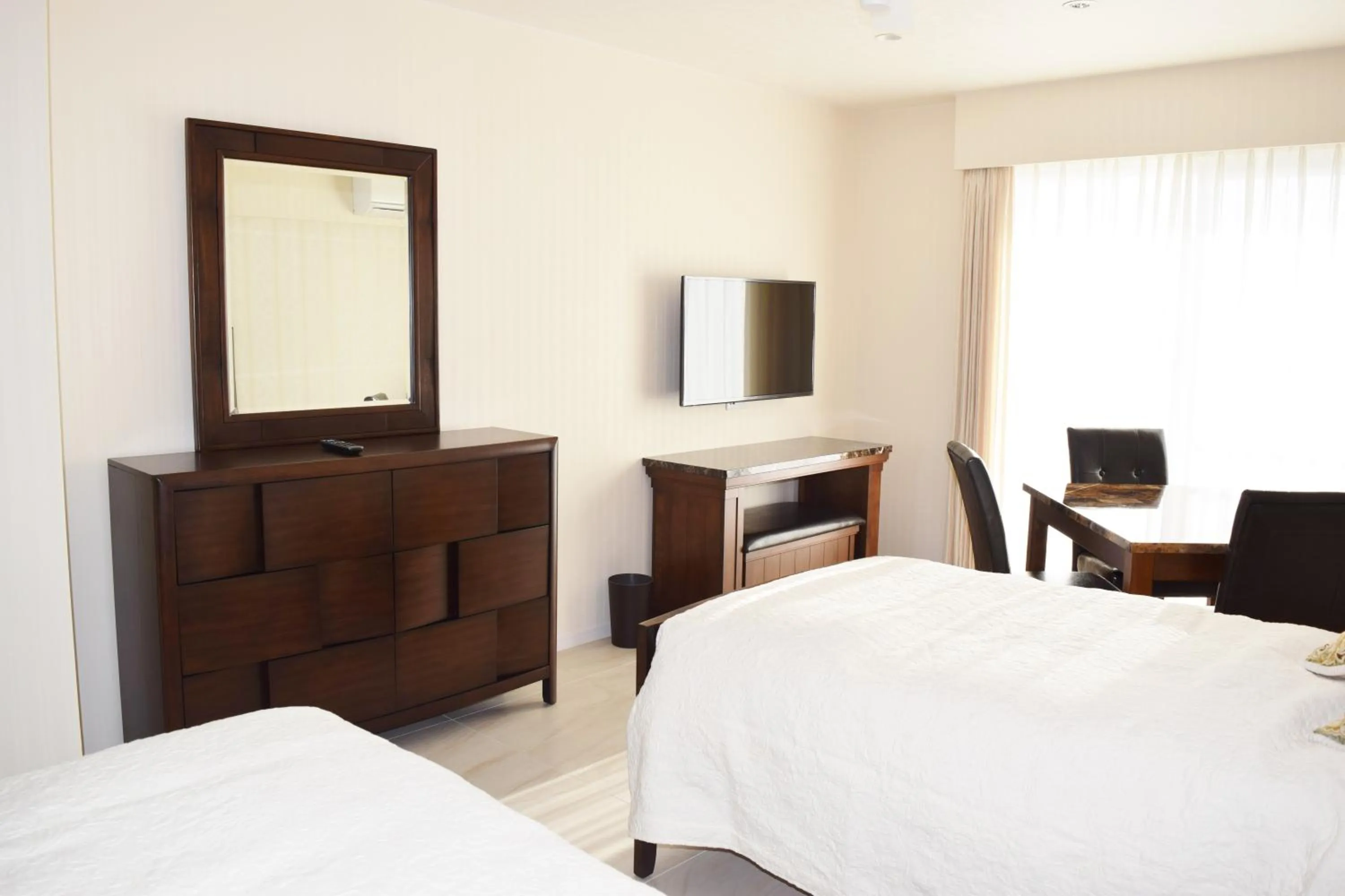 Bed in Wisteria Condominium Resort