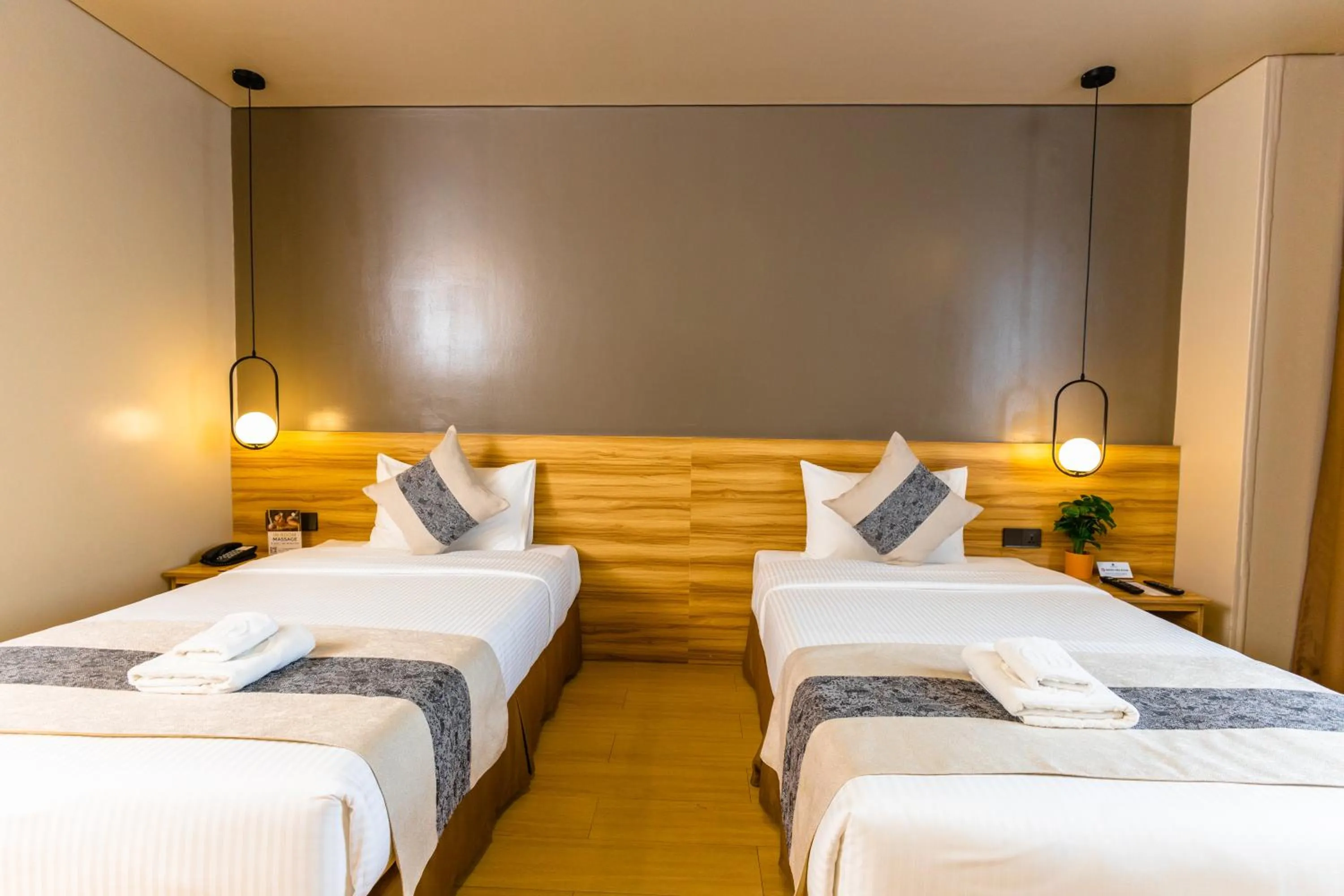 Bed in Madison 101 Hotel + Tower