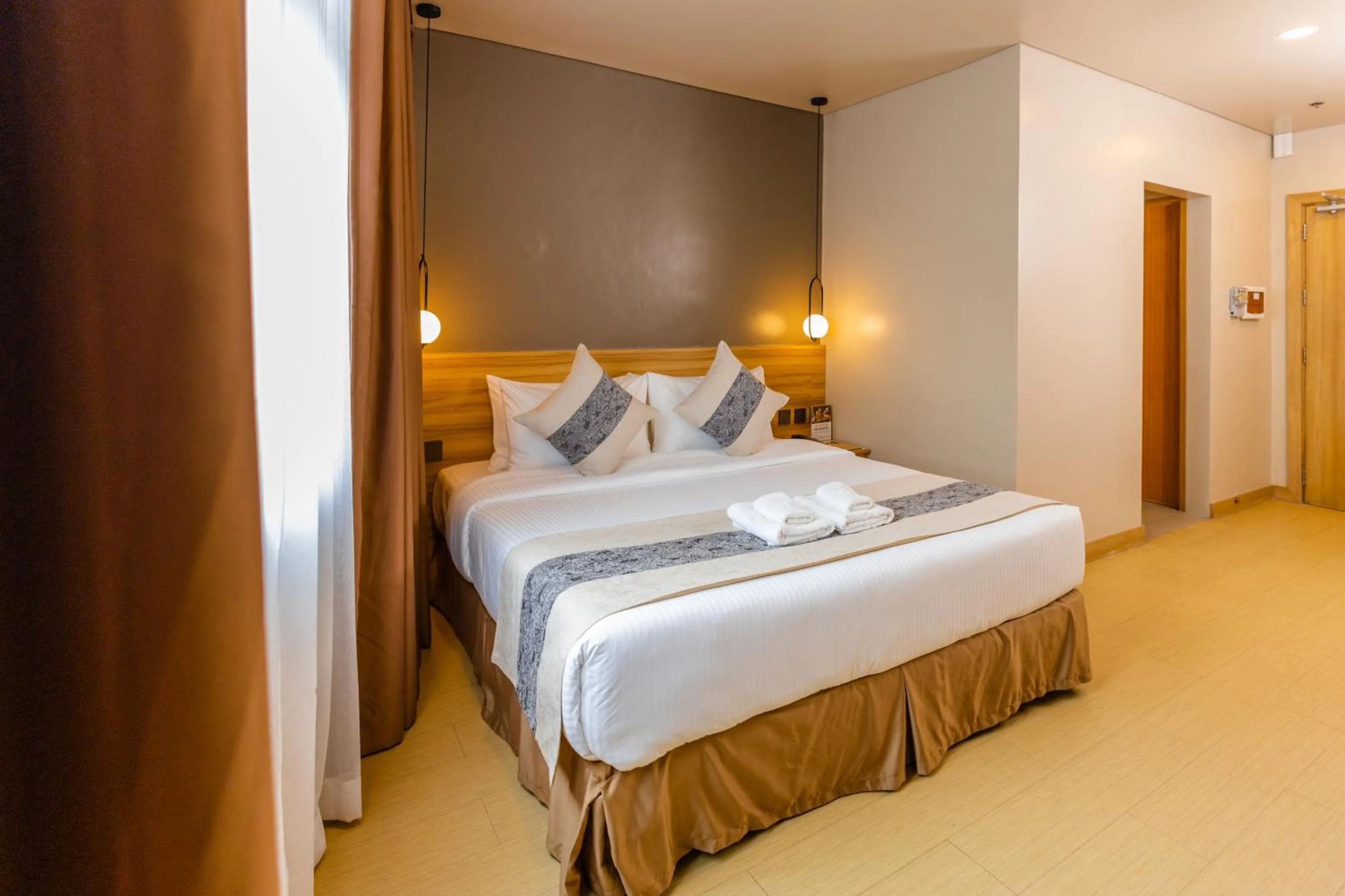 Bed in Madison 101 Hotel + Tower