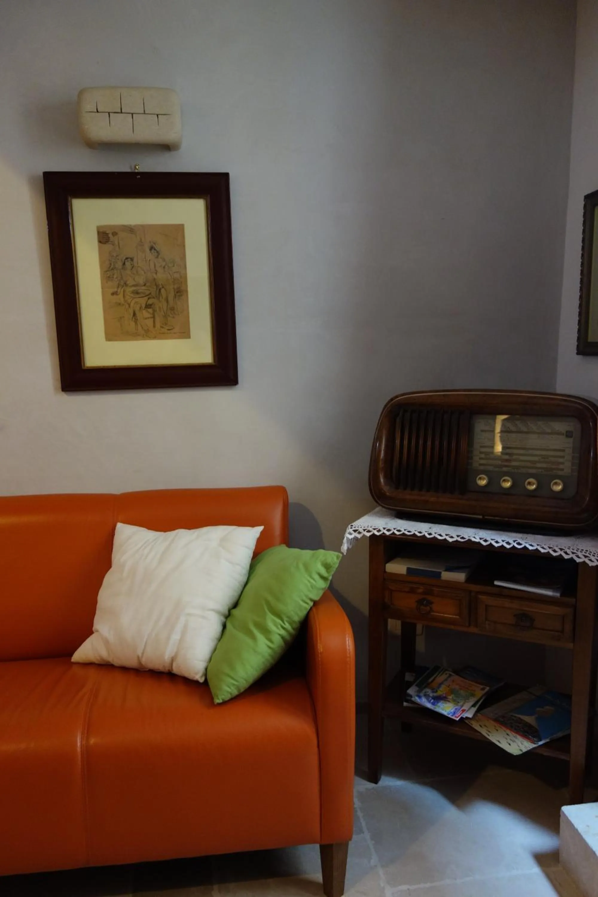 Communal lounge/ TV room in B&B Al Duomo