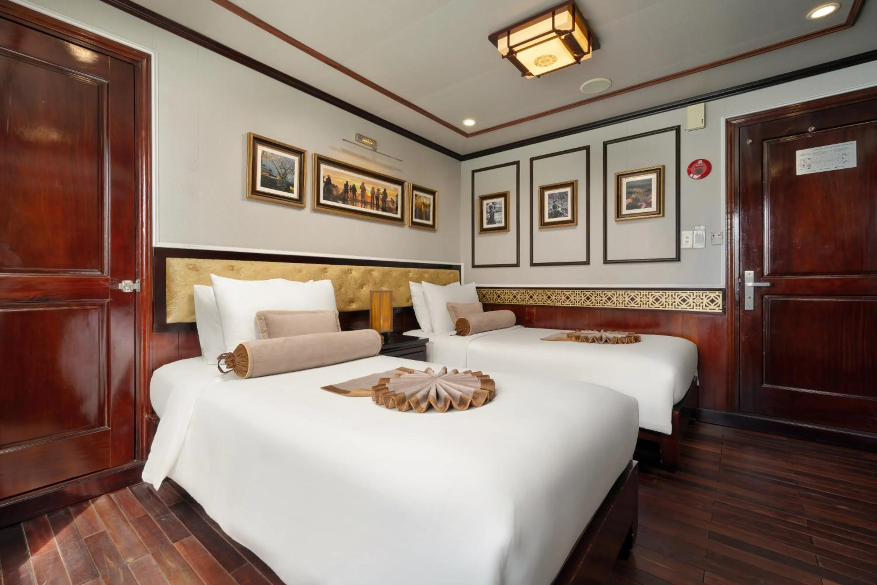 Photo of the whole room, Bed in Swan Cruises Halong