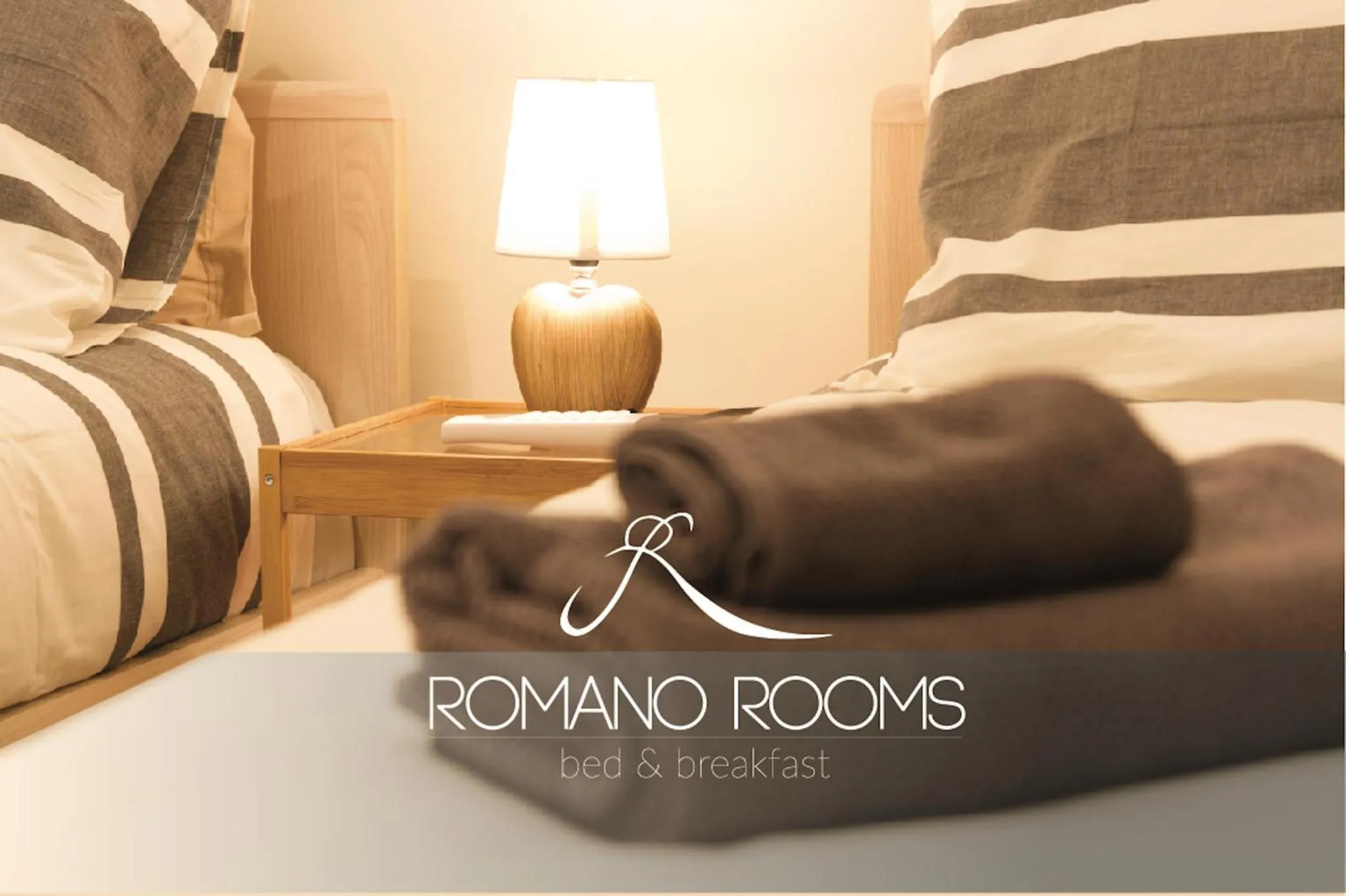 Property logo or sign, Bed in Romano Rooms