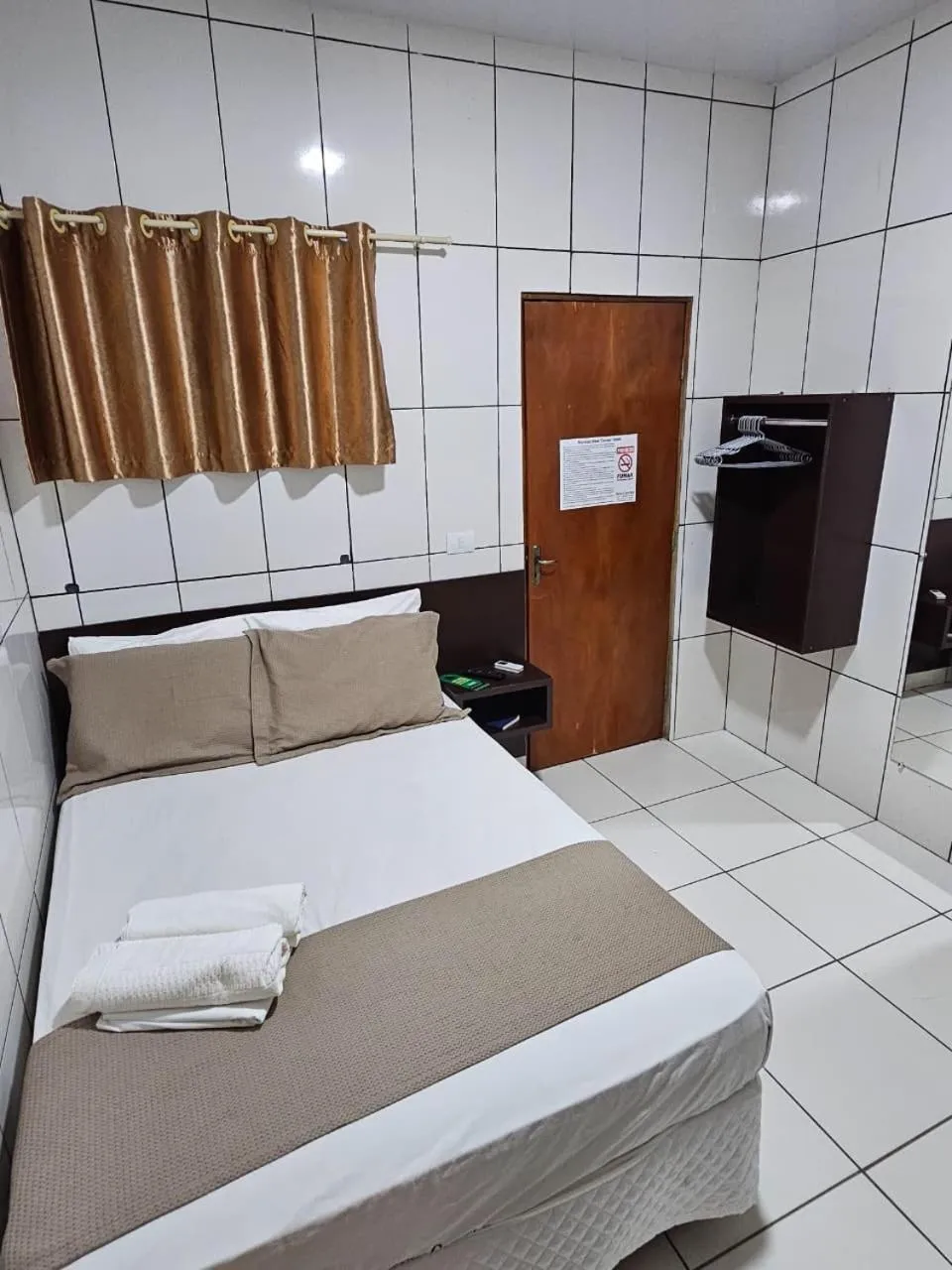 Photo of the whole room, Bed in New Center Hotel