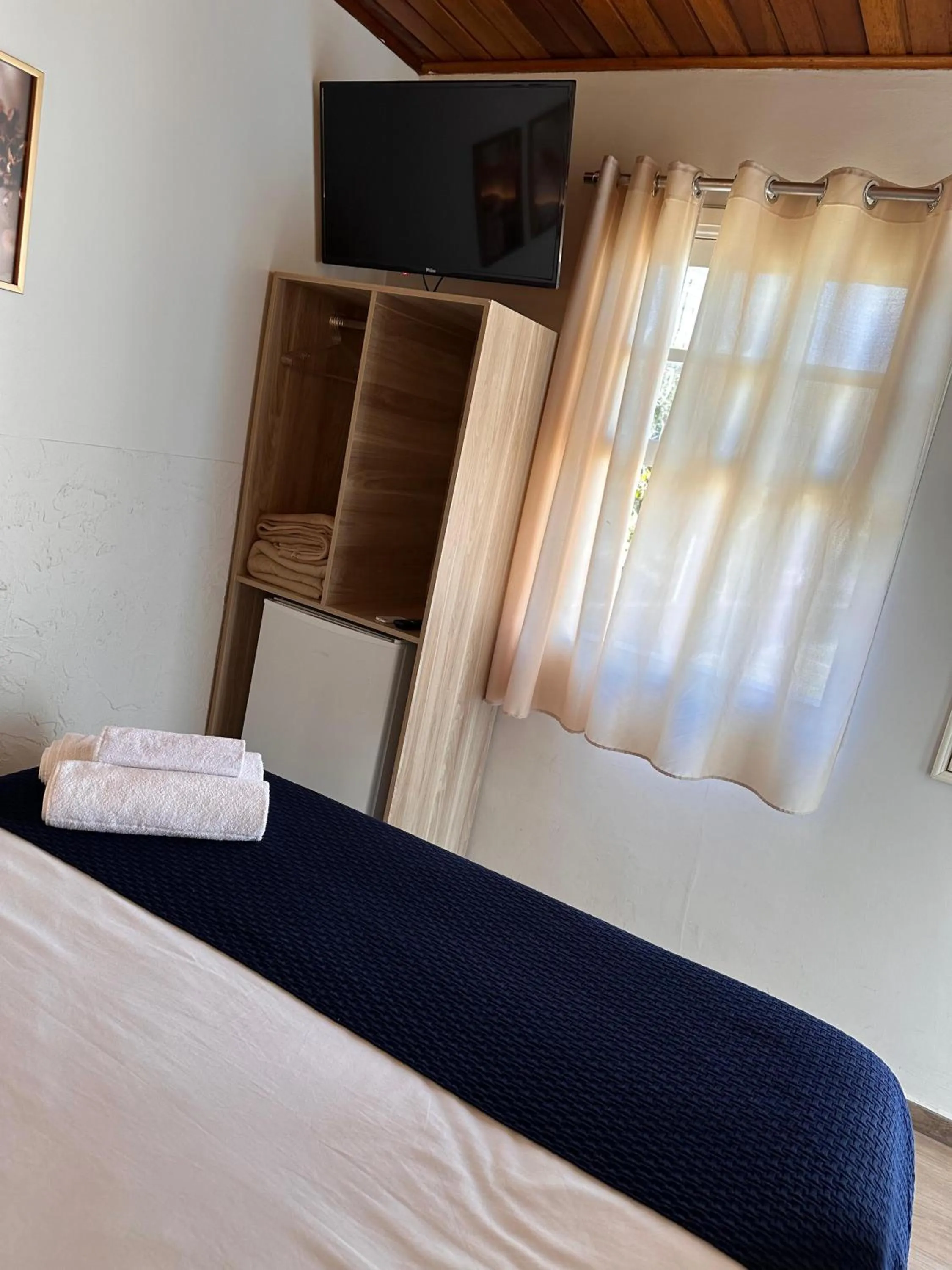 TV and multimedia, Bed in Pousada Vila Tio Lé