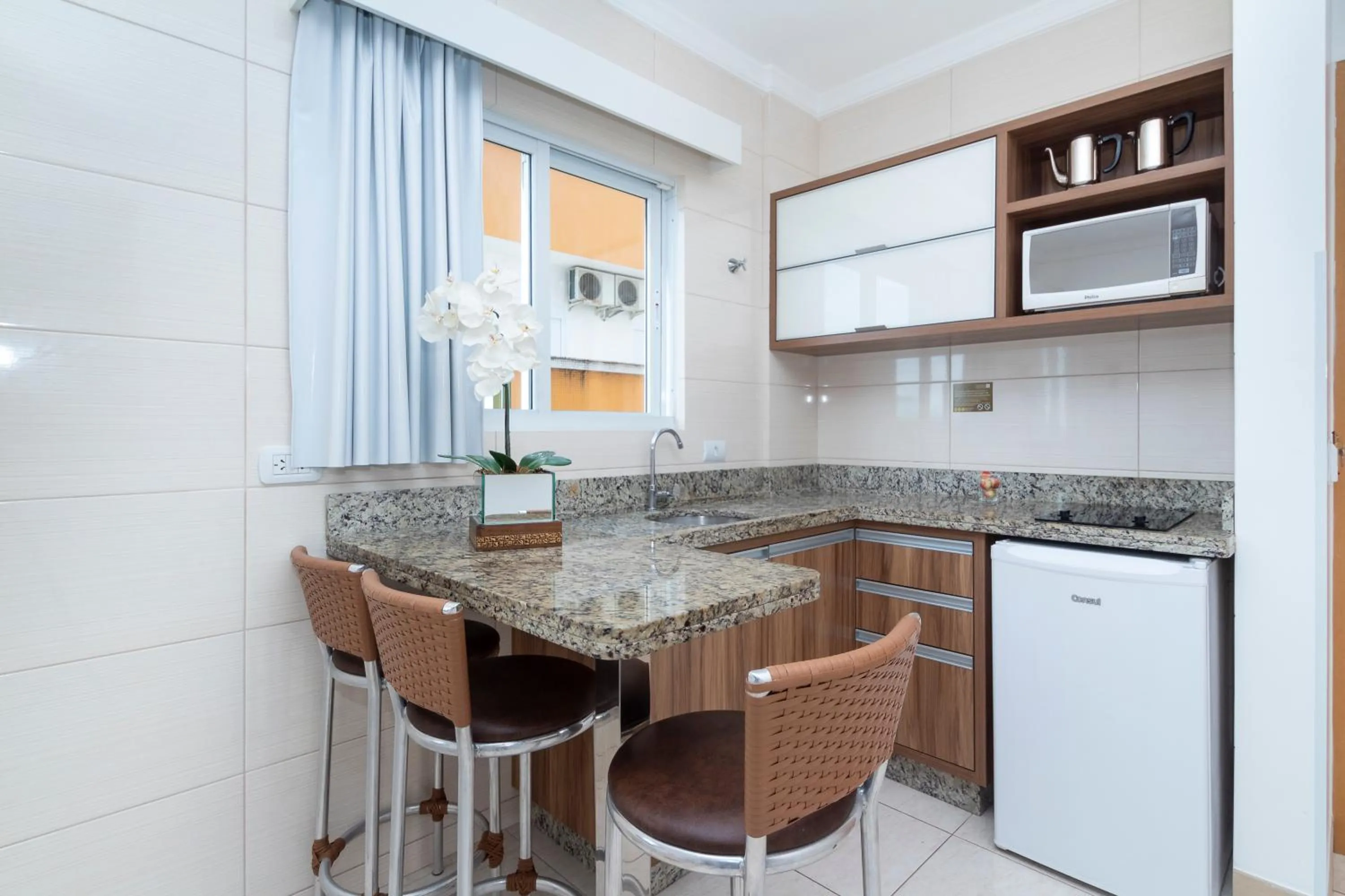 Kitchen or kitchenette in Pousada Riviera Bombinhas
