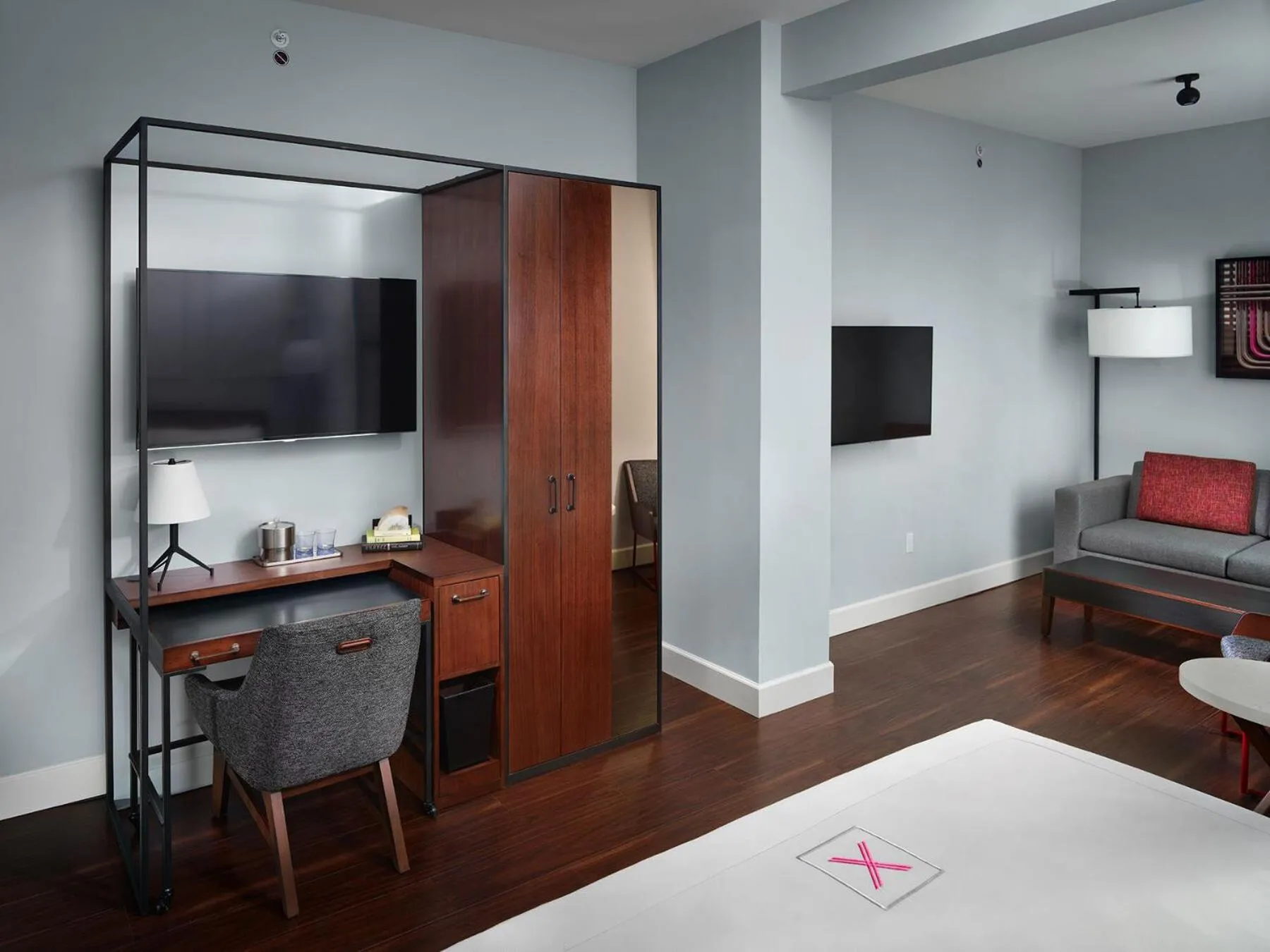 Seating area, Bed in Axiom Hotel