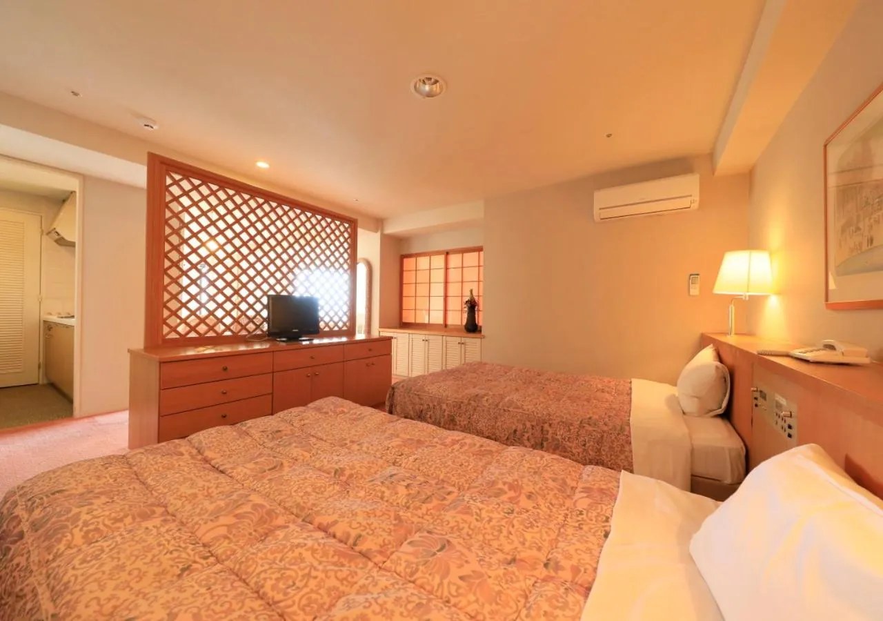 Bed in Kamogawa Grand Tower