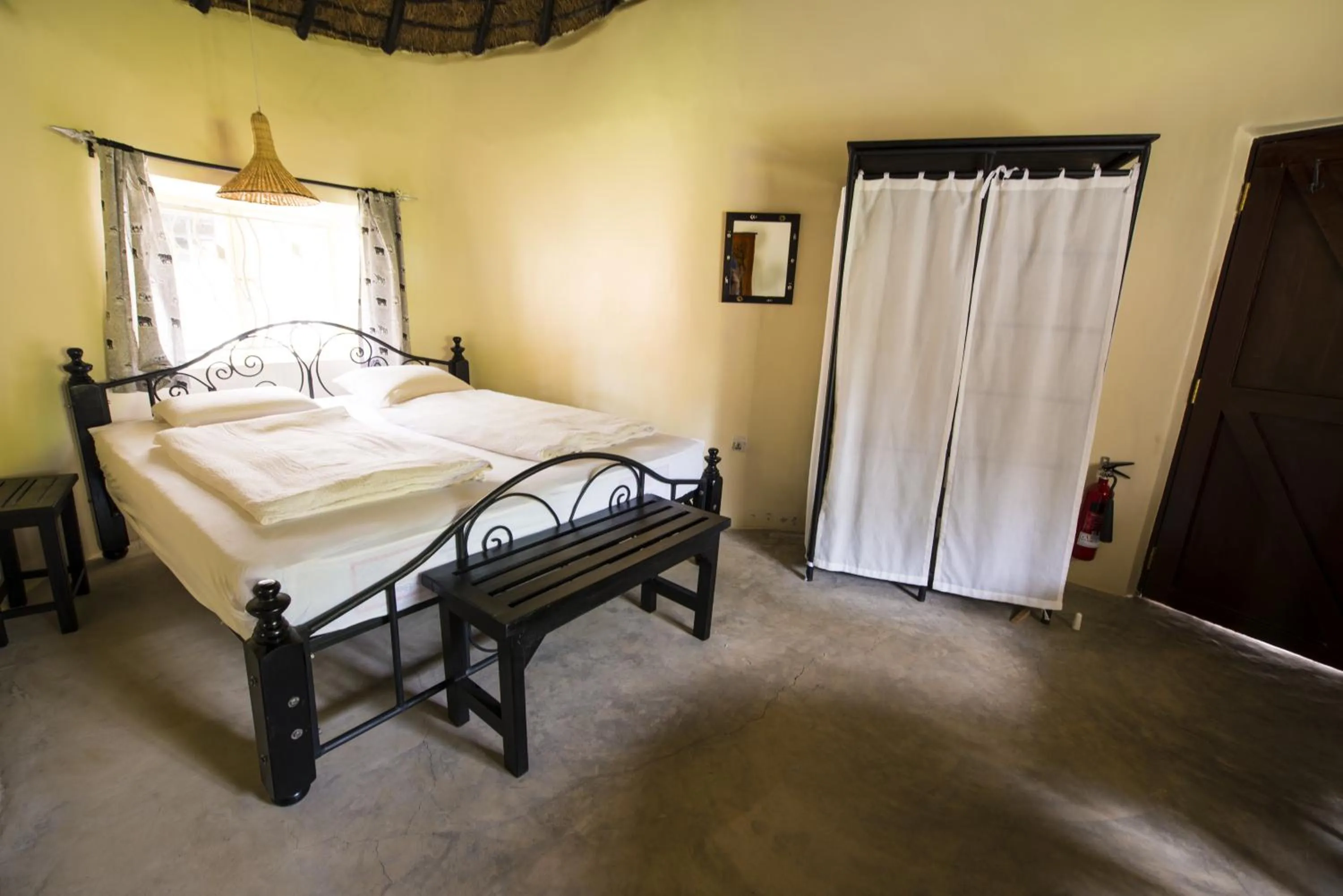 Bed in Nyati Hill Cottages