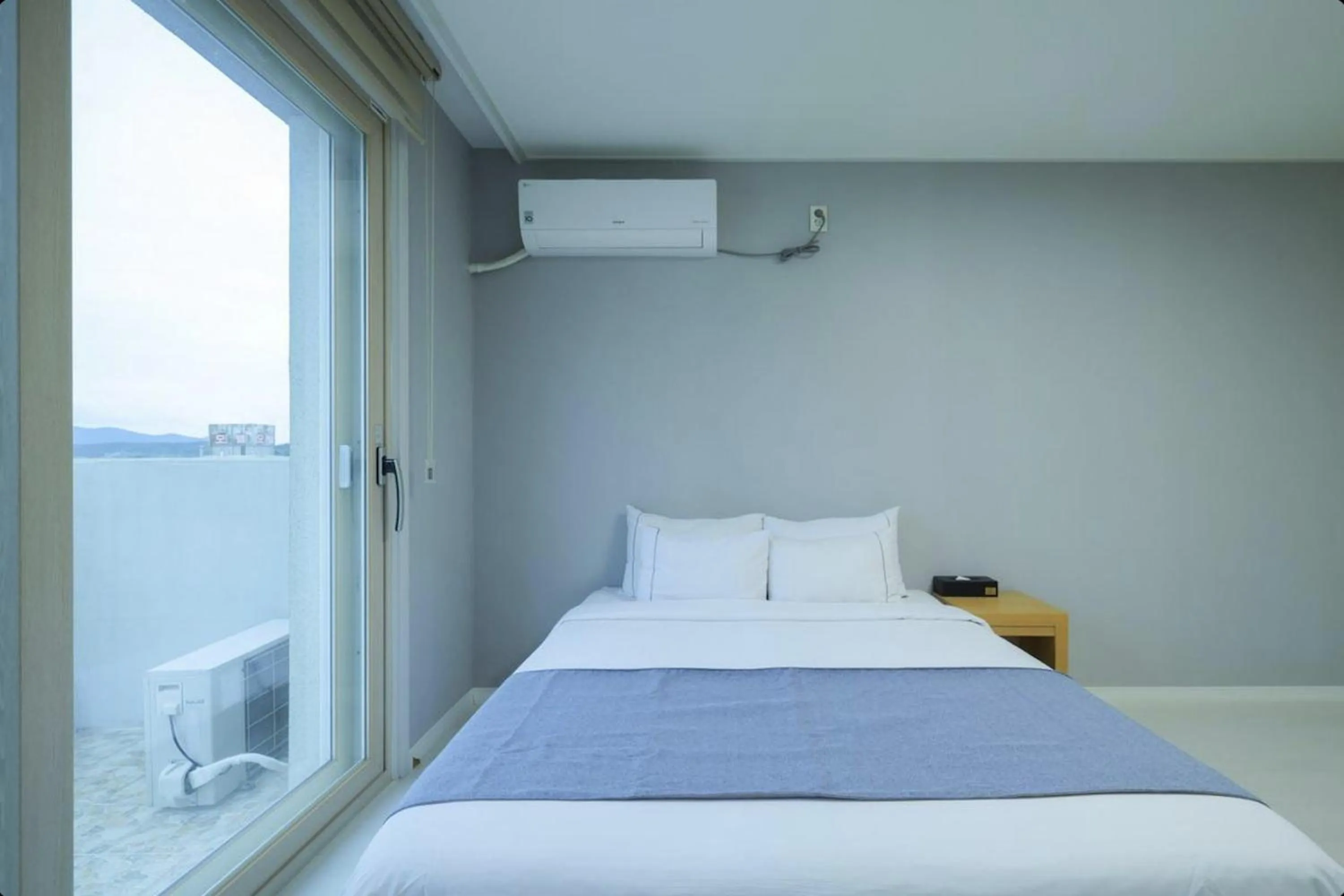 Bed in Yeosu Hotel Zava