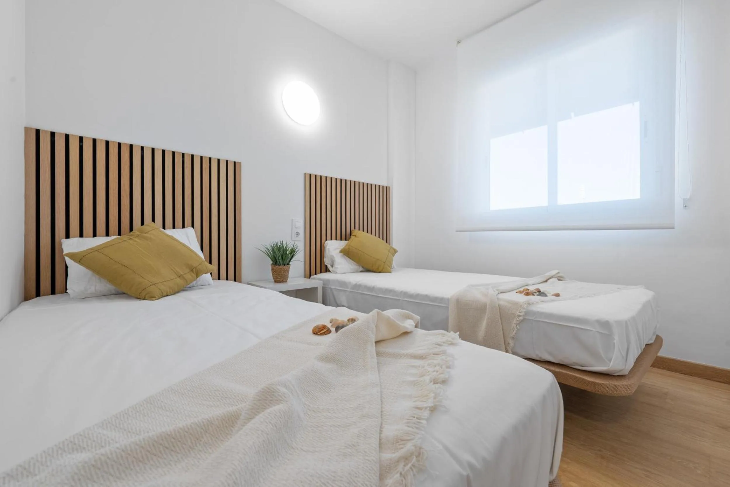 Bed in AQUAMARINA II Apartments