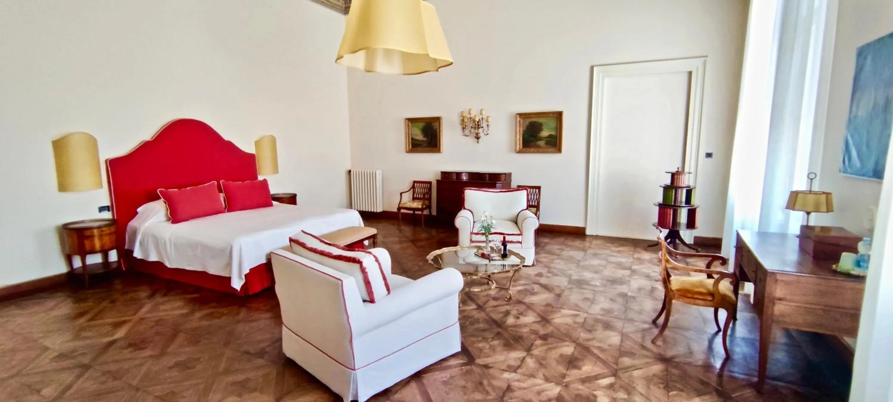 Bed in Palazzo Mantua Benavides Suites & Apartments