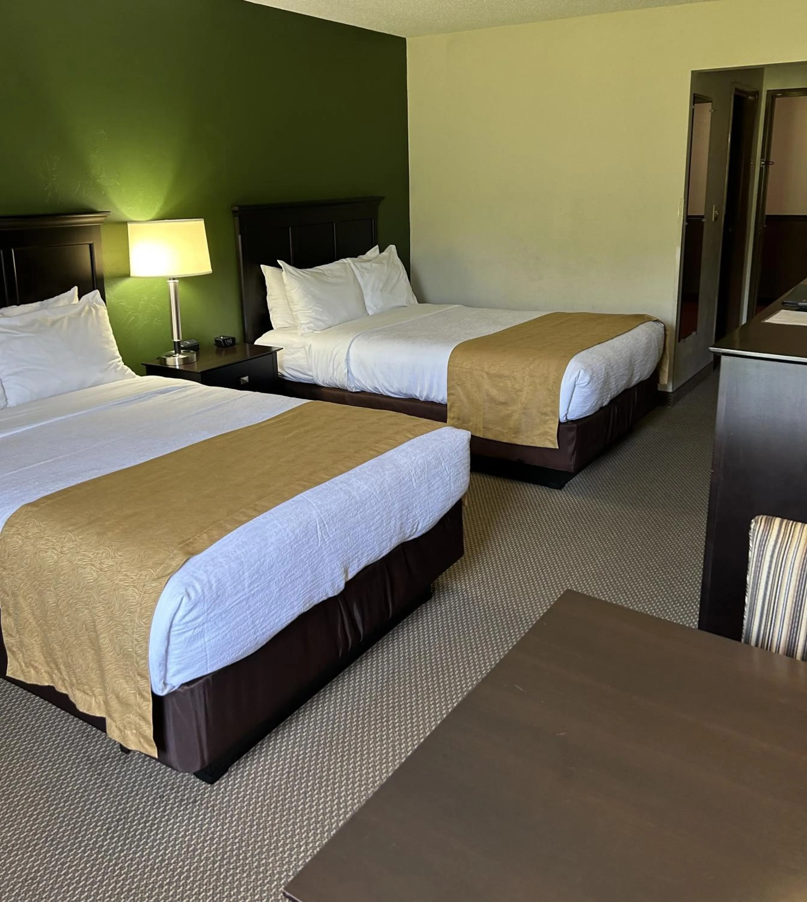 Bed in Boarders Inn & Suites by Cobblestone Hotels - Munising