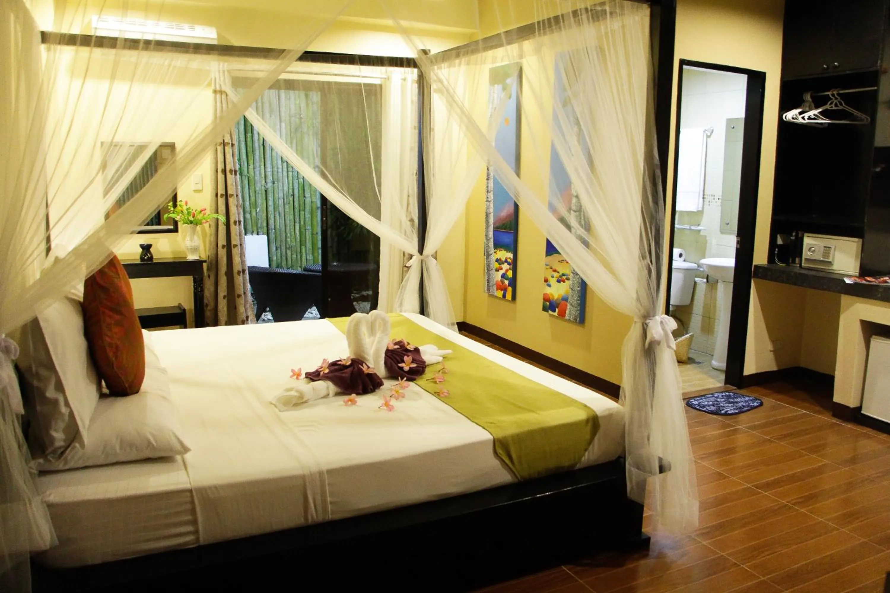Bed in Sulu Sea Boutique Hotel