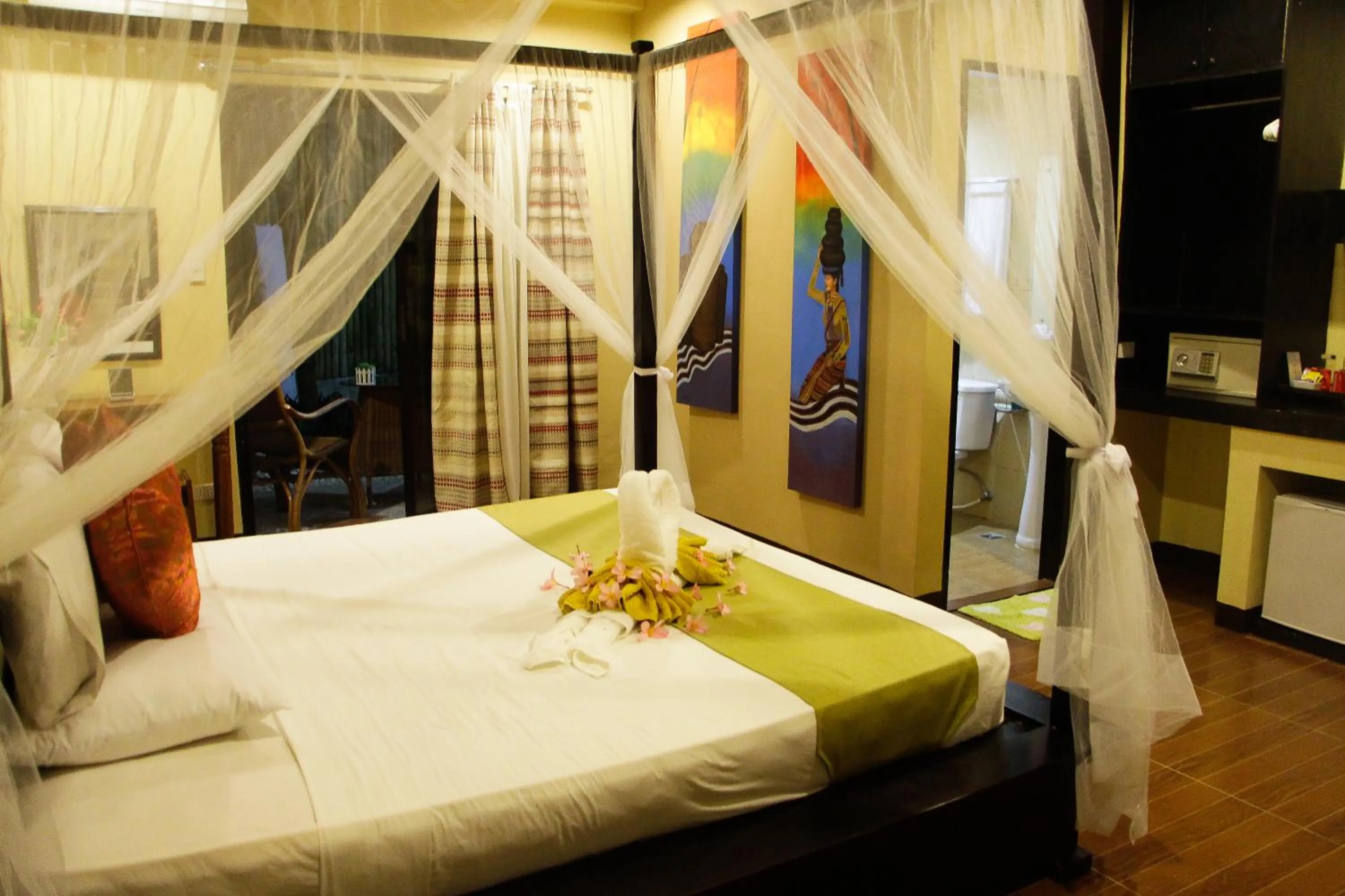 Bed in Sulu Sea Boutique Hotel