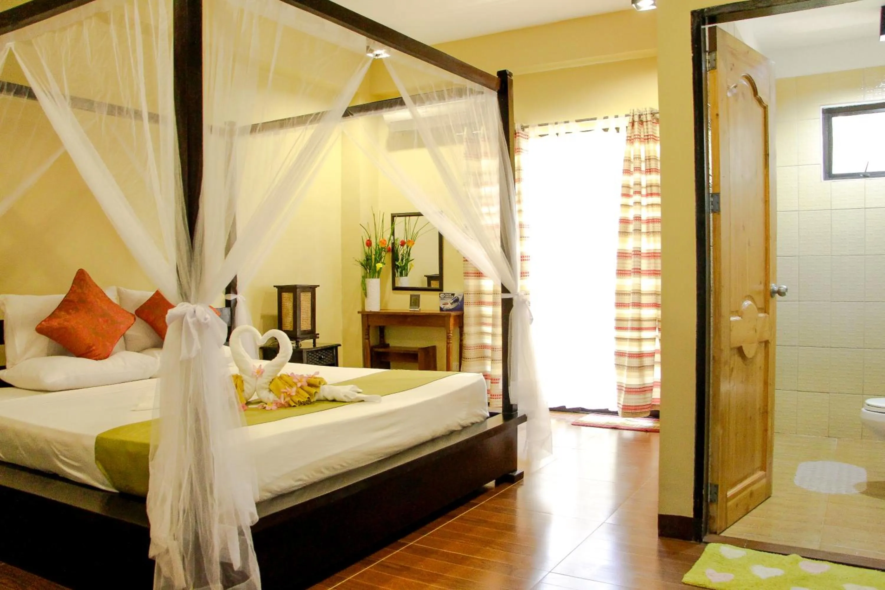 Bed in Sulu Sea Boutique Hotel