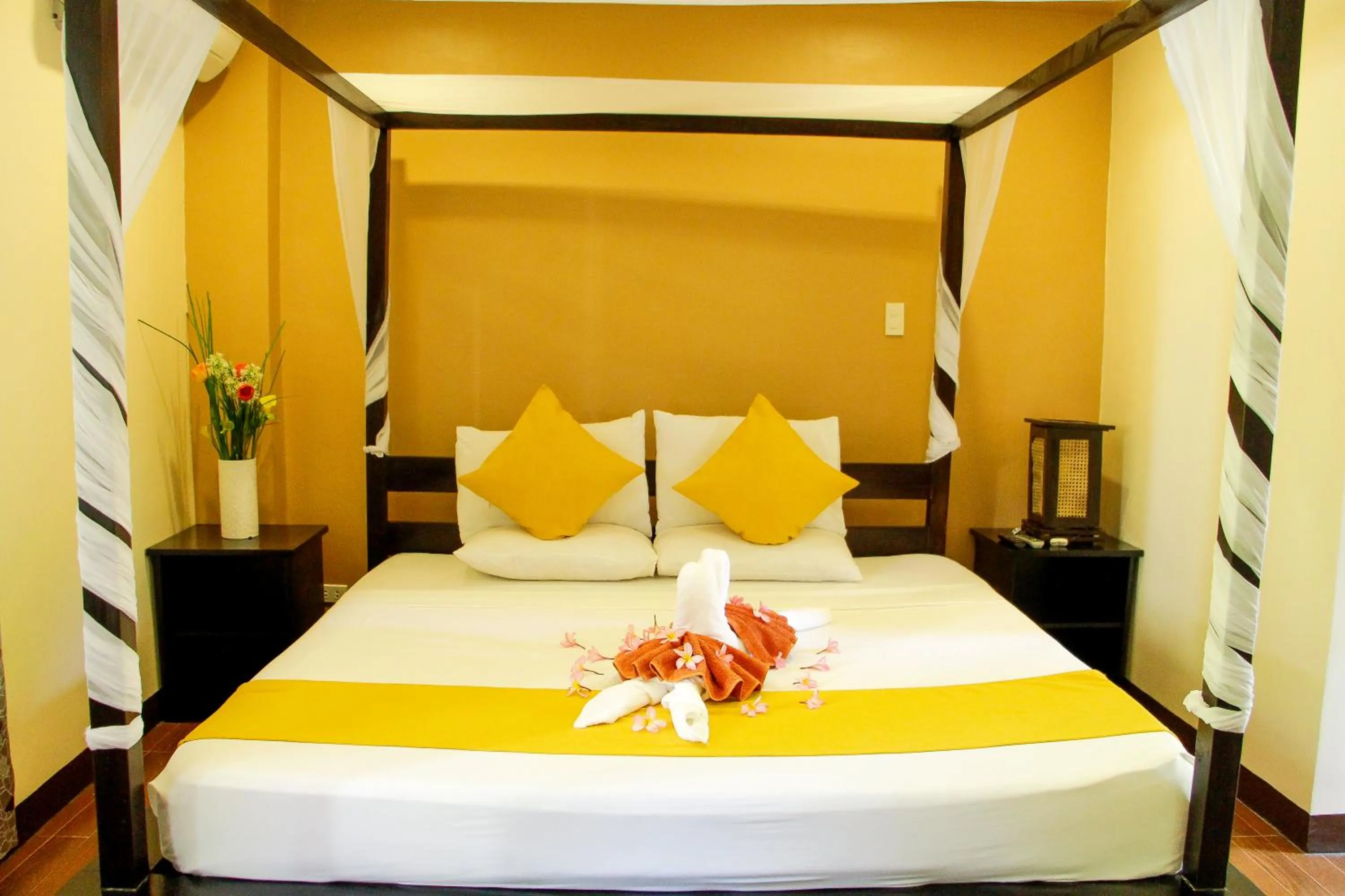 Bed in Sulu Sea Boutique Hotel