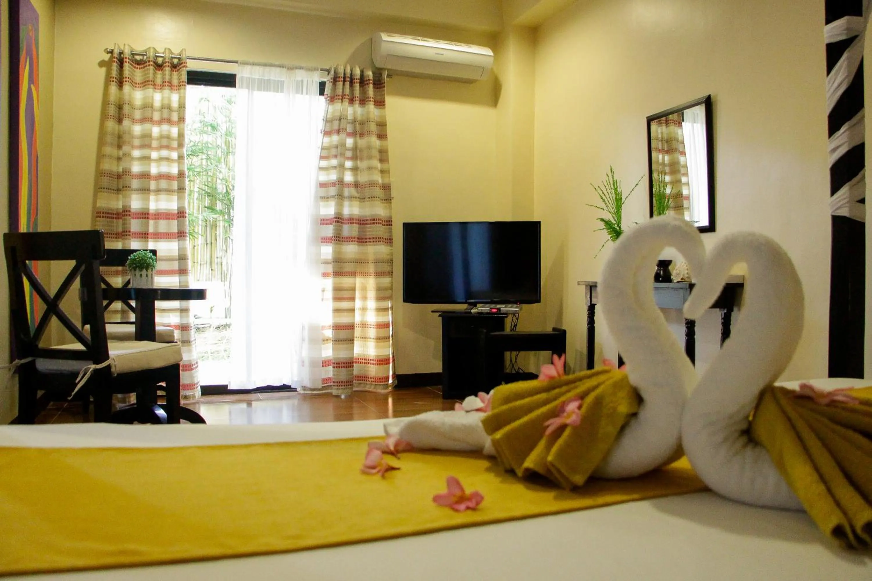 Bed in Sulu Sea Boutique Hotel