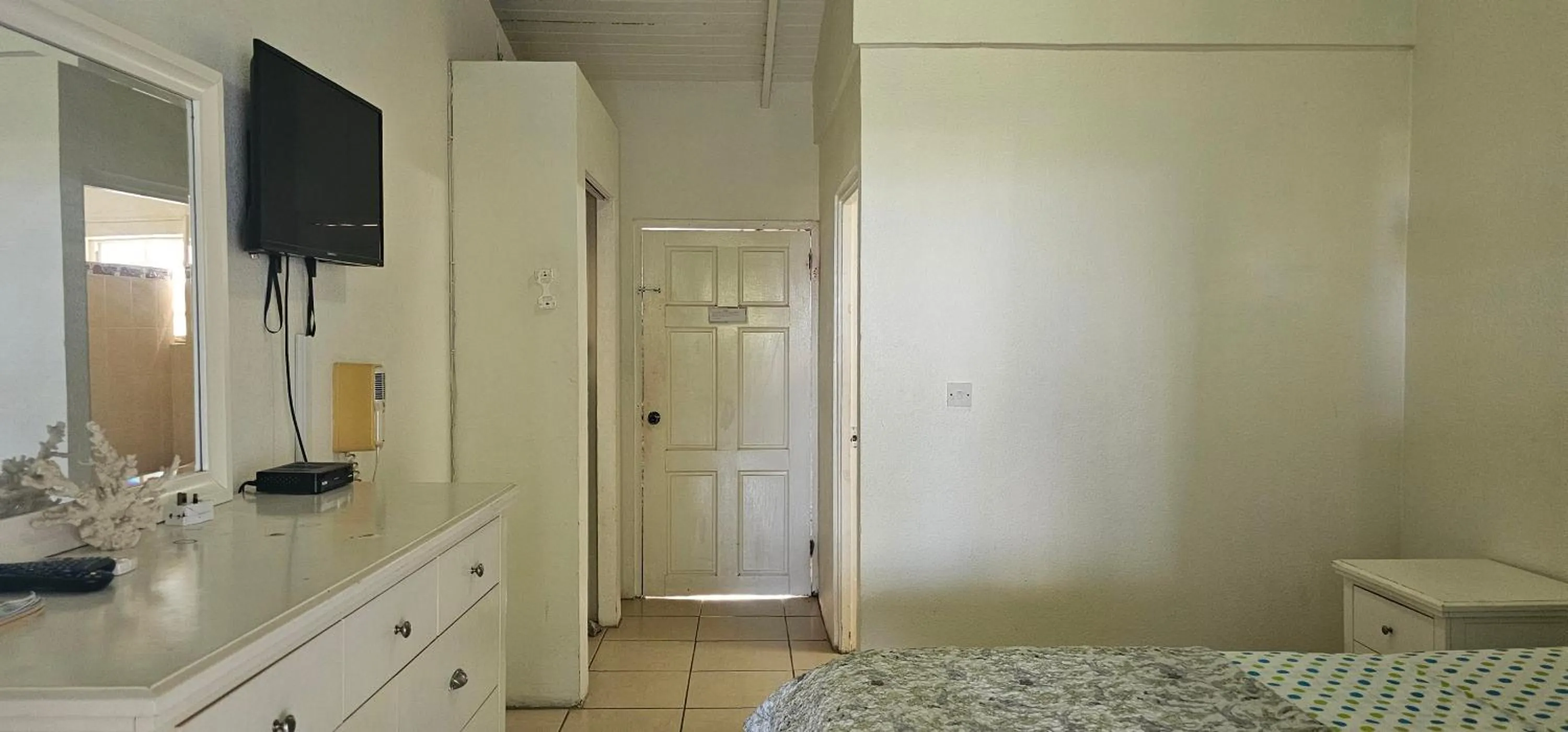 Bed in Wavecrest Suites