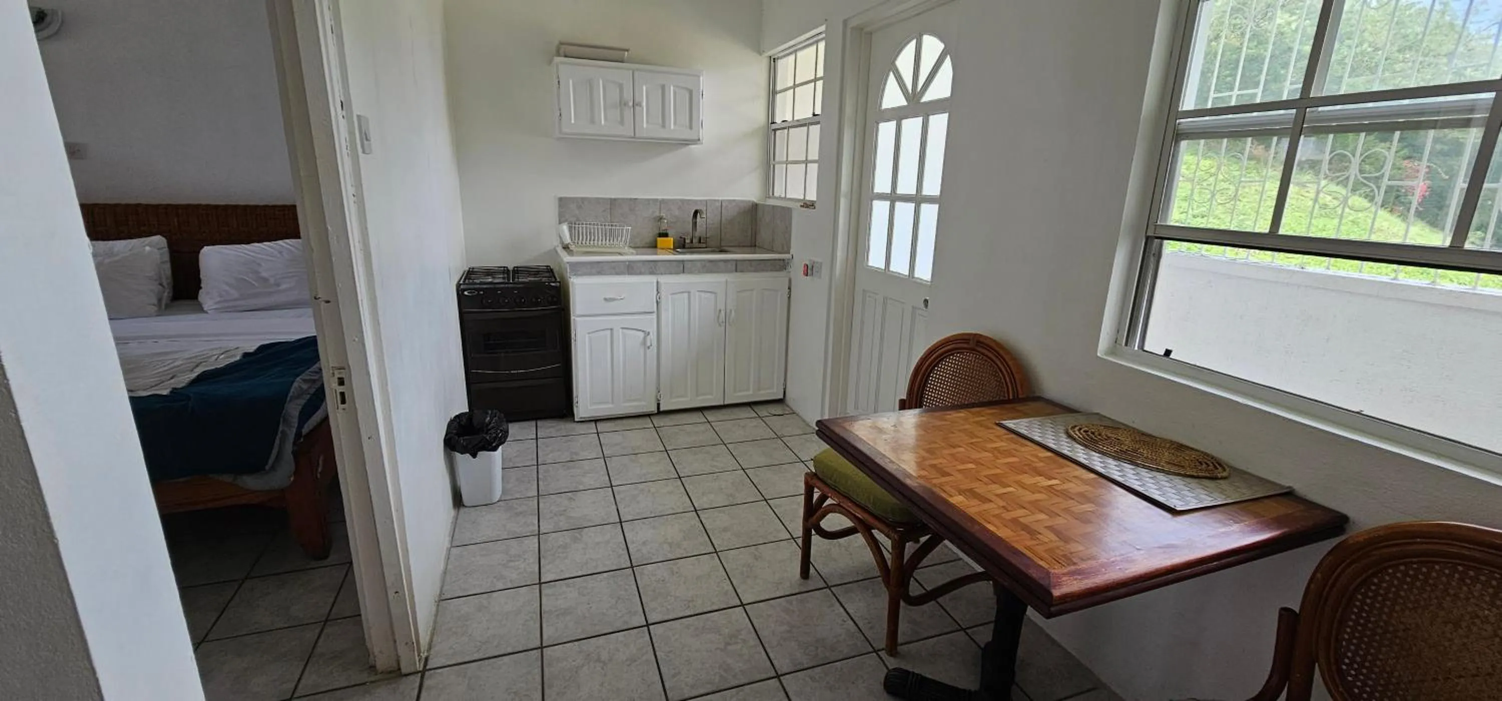 Bed in Wavecrest Suites