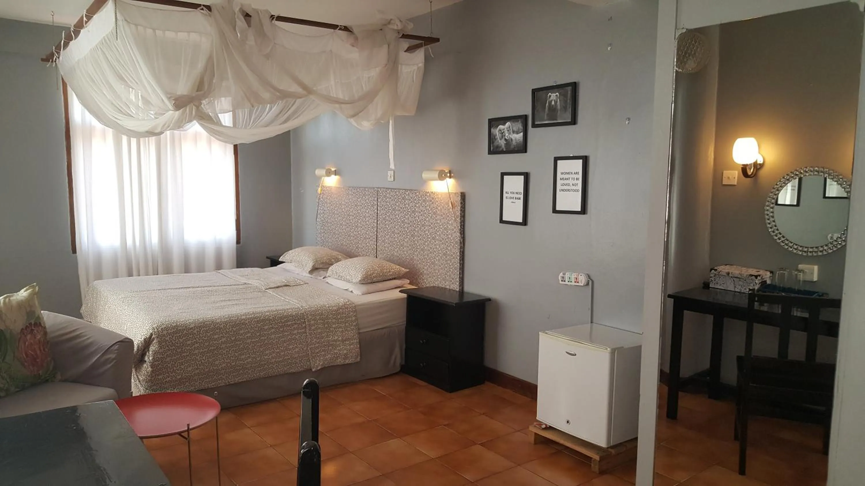 Bed in Q-Bar & Guesthouse