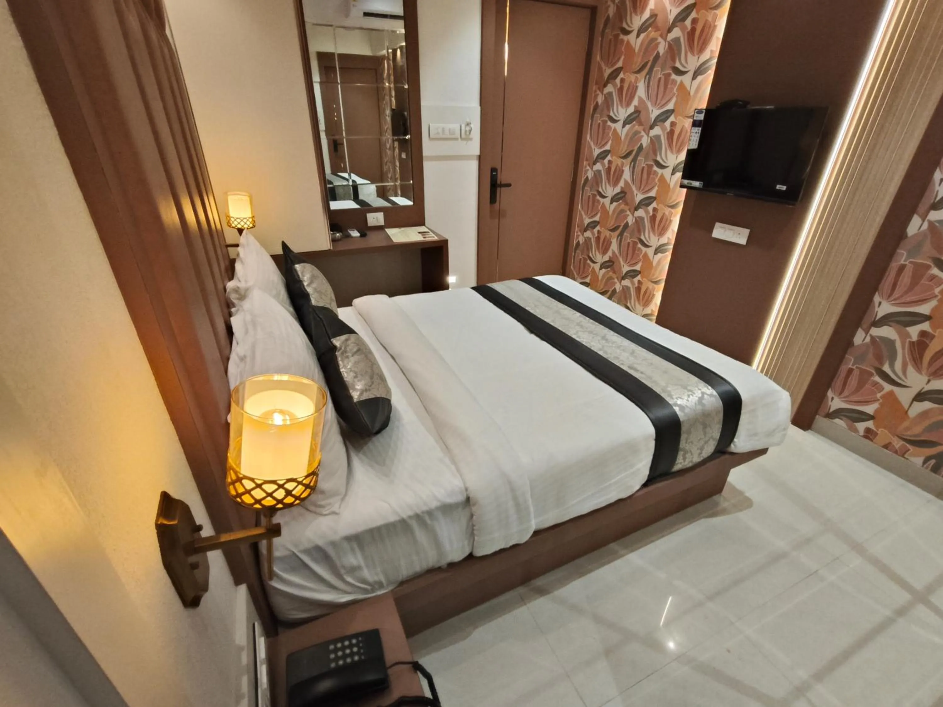Bed in Hotel Melody Boutique Thane
