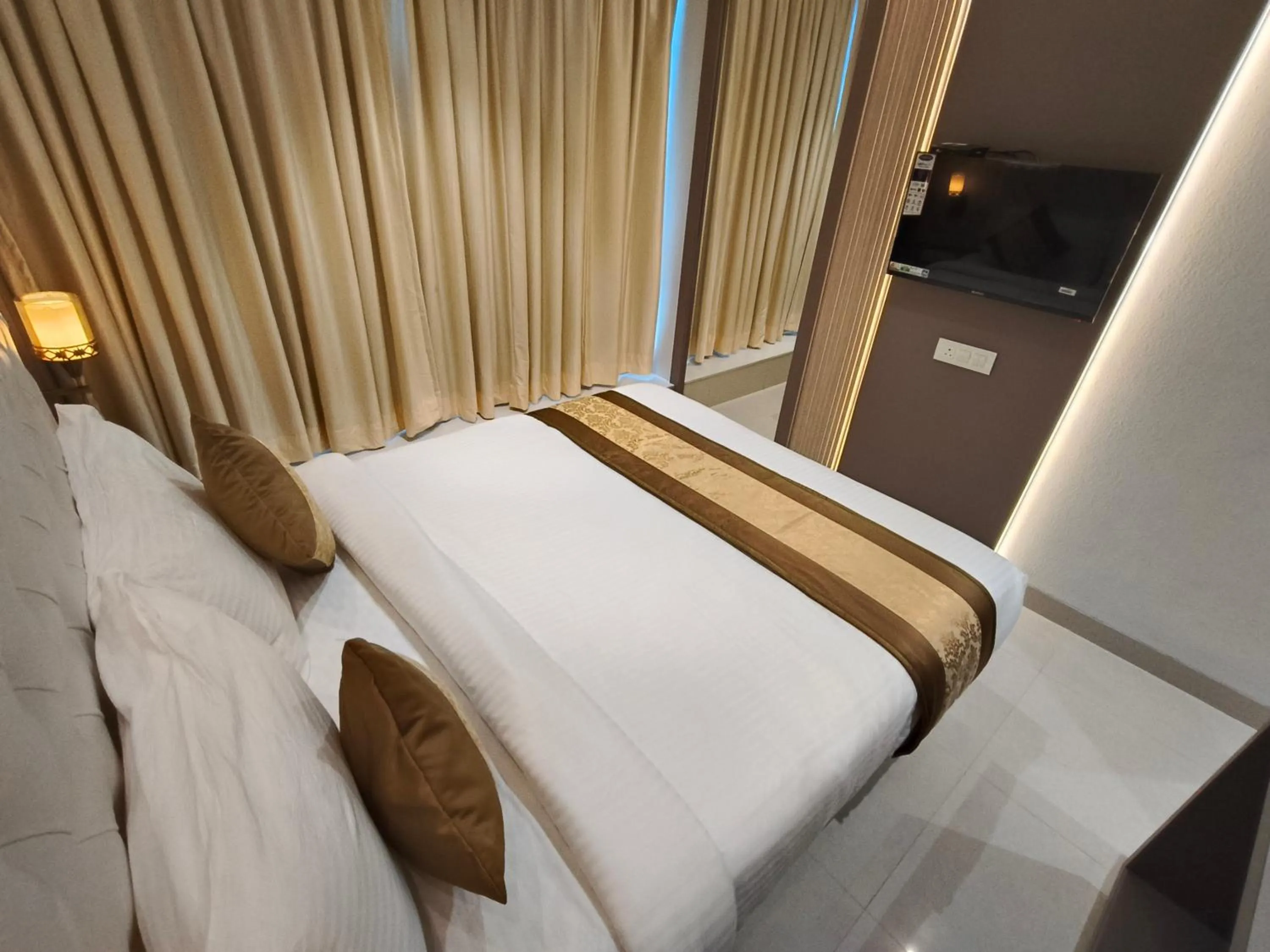 Bed in Hotel Melody Boutique Thane
