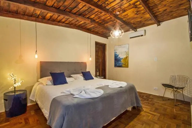 Bed in Villa Vintage Campos - Piscina e opções de suites com hidromassagem
