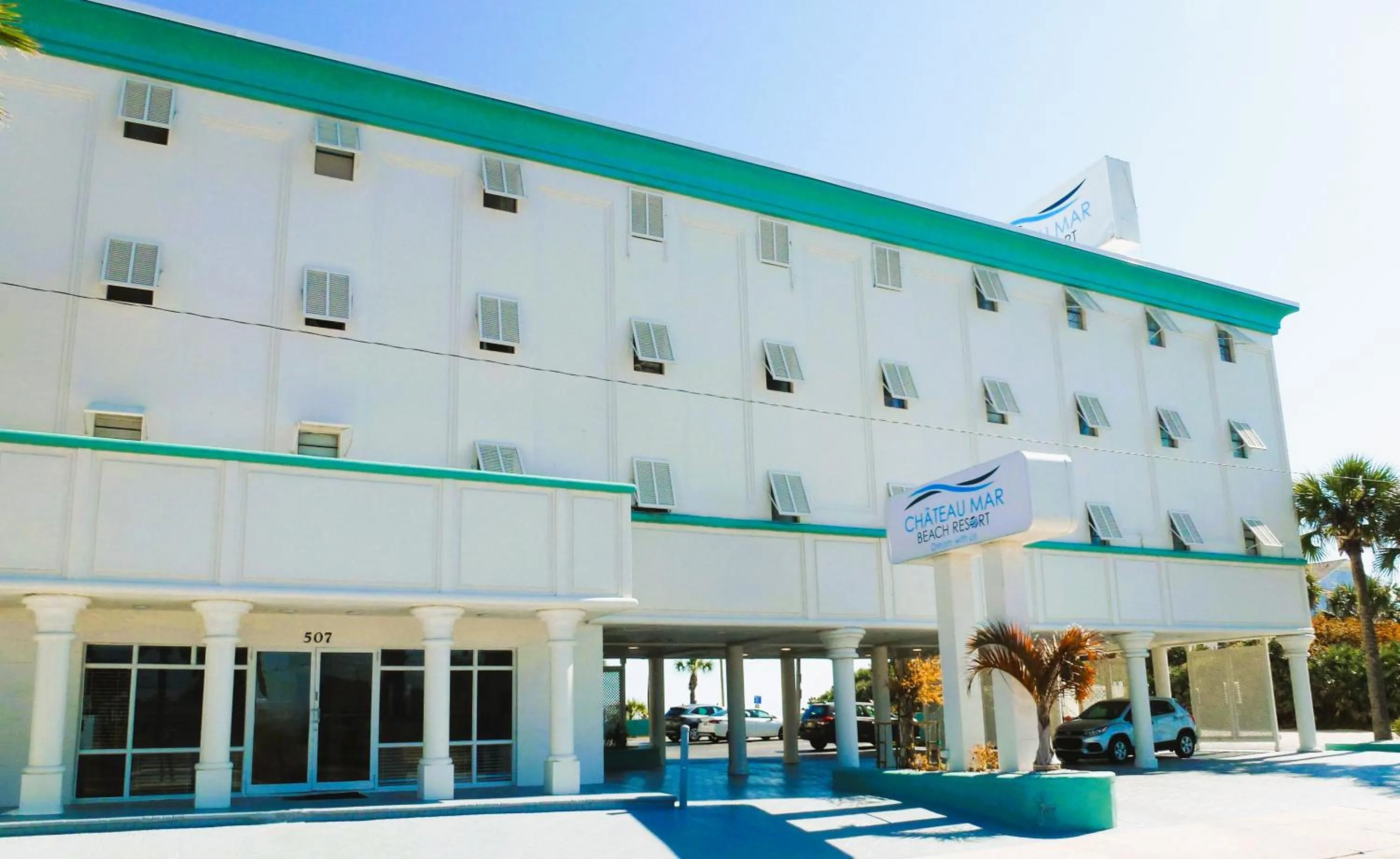 Property building in Chateau Mar Beach Hotel NEWLY REFURBISHED
