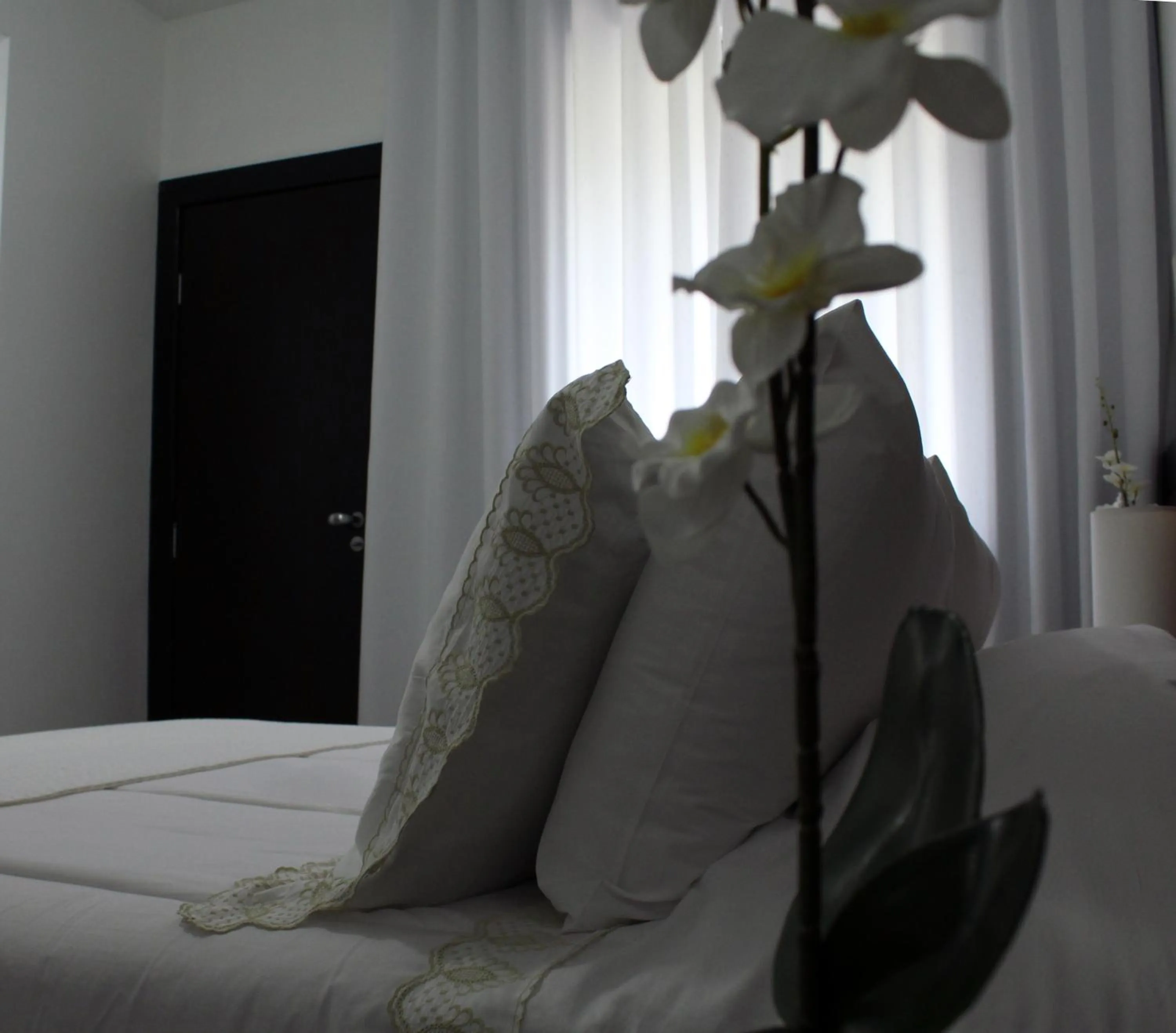 Bed in Hotel Dom Henrique