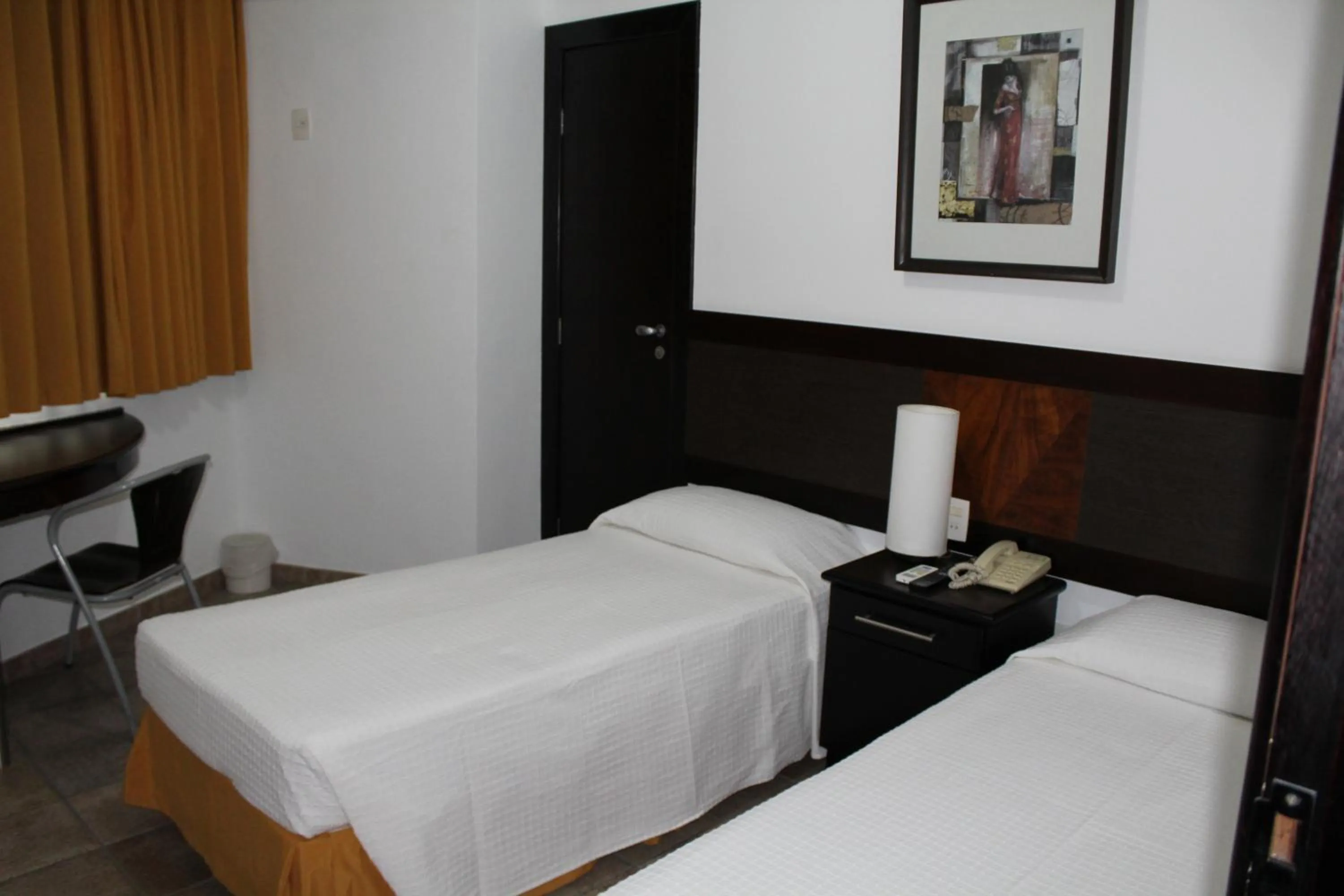 Bed in Hotel Dom Henrique