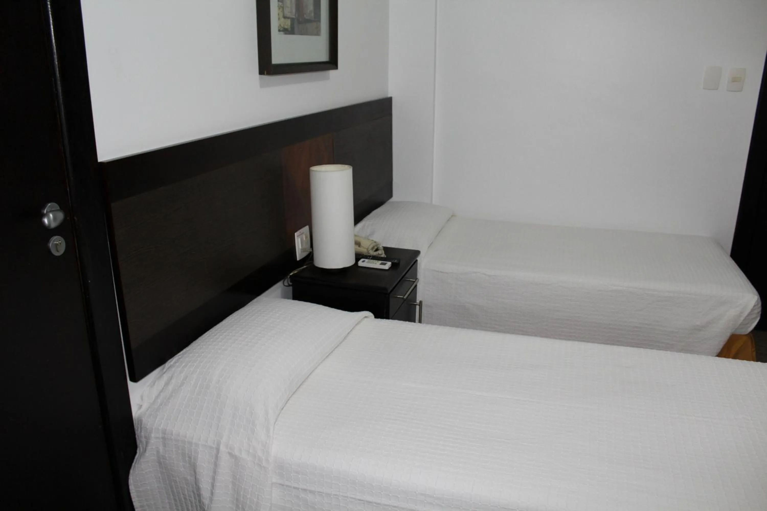 Bed in Hotel Dom Henrique