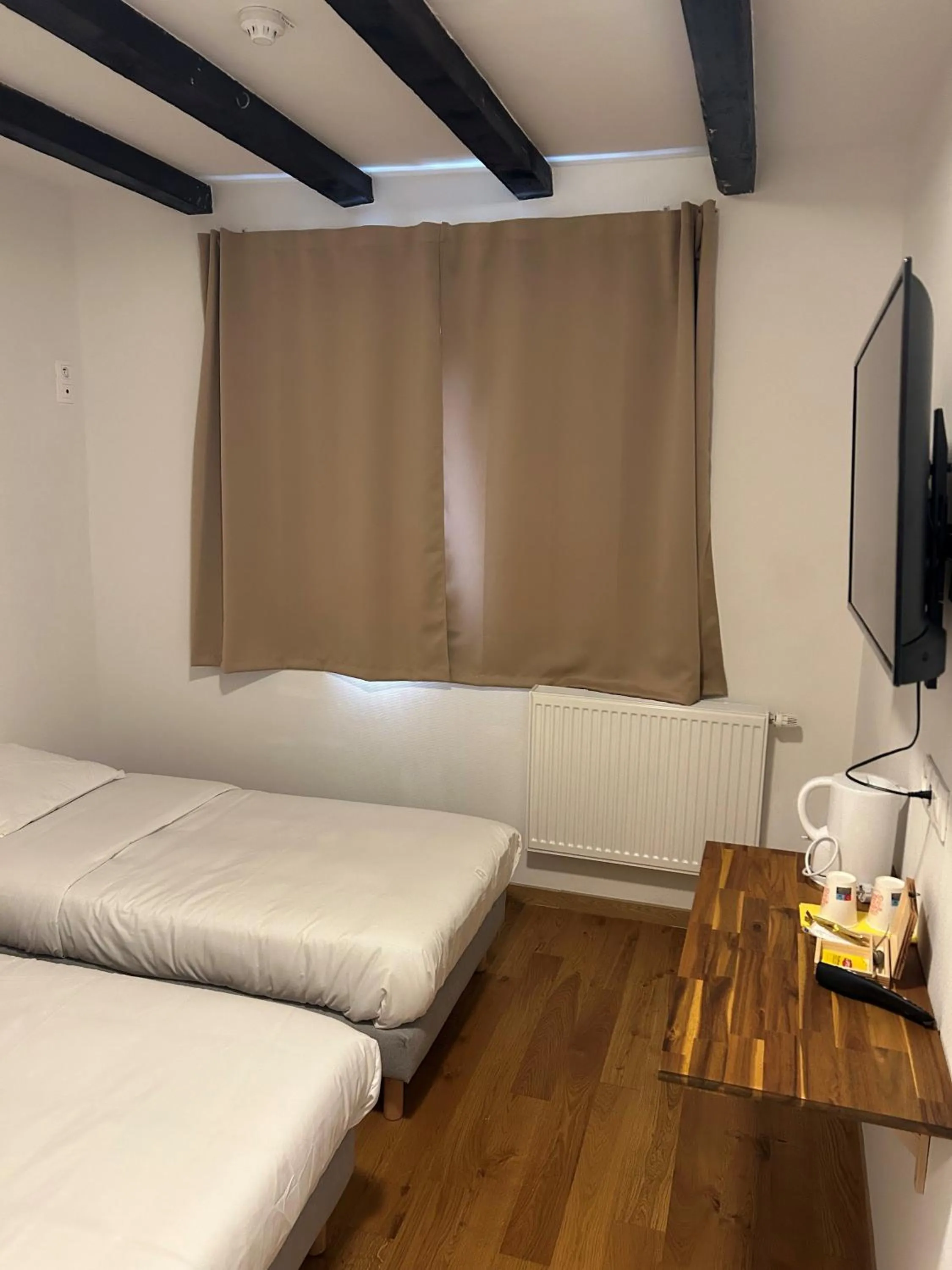 Bed in Hôtel Arc-en-Ciel