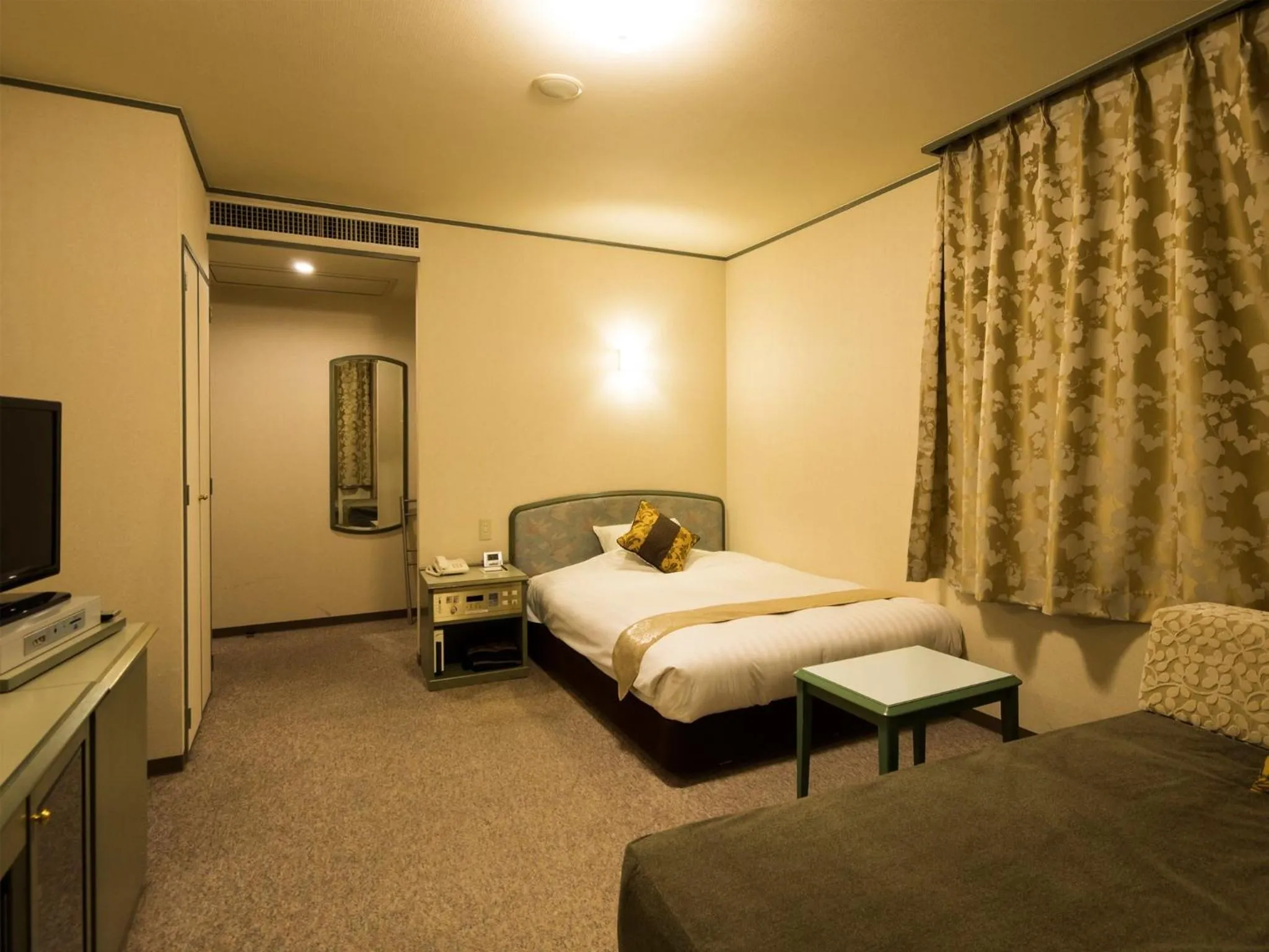 Photo of the whole room, Bed in Hotel Areaone Hiroshima Wing