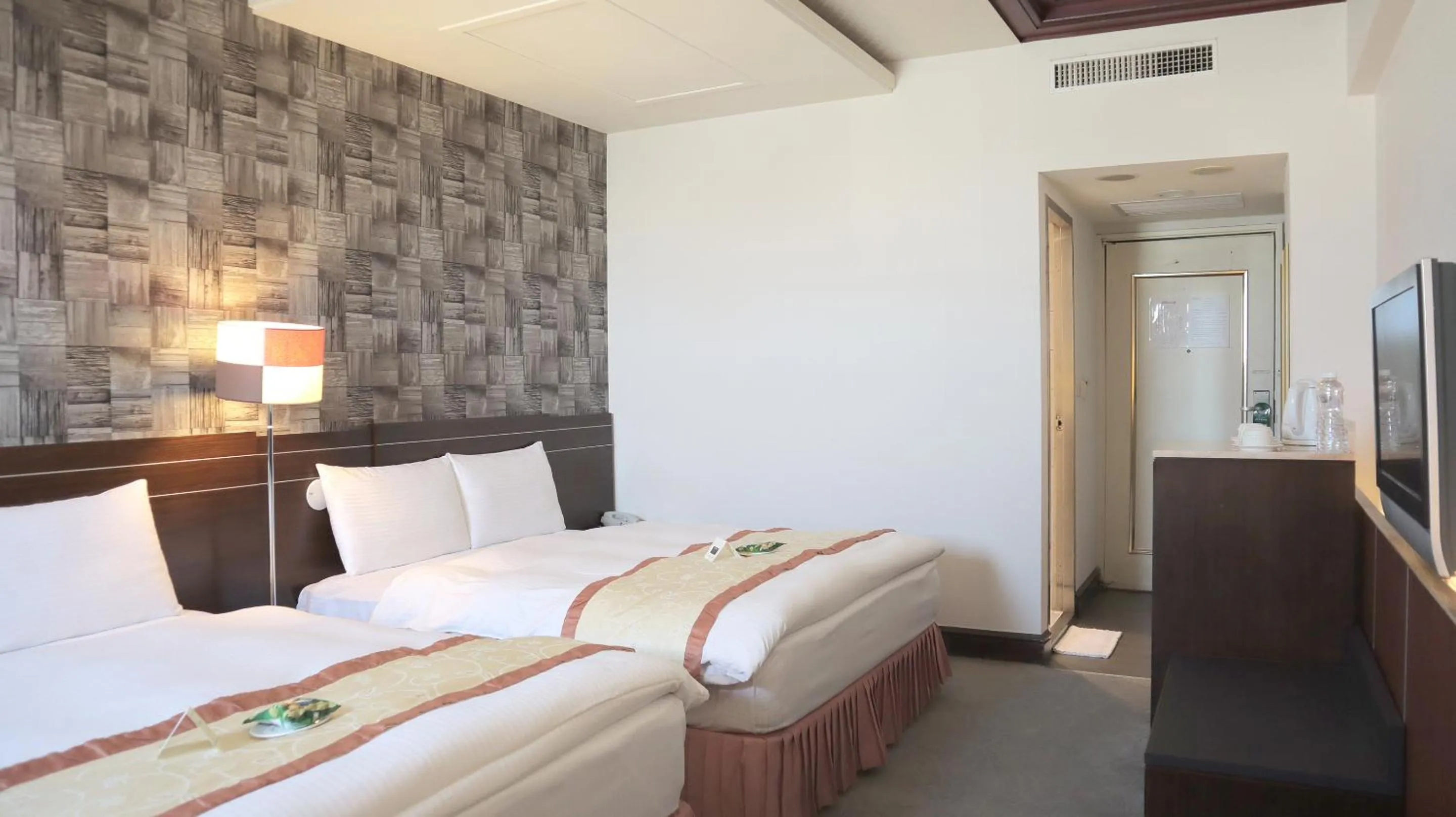 Bed in Ho Fong Business Stay