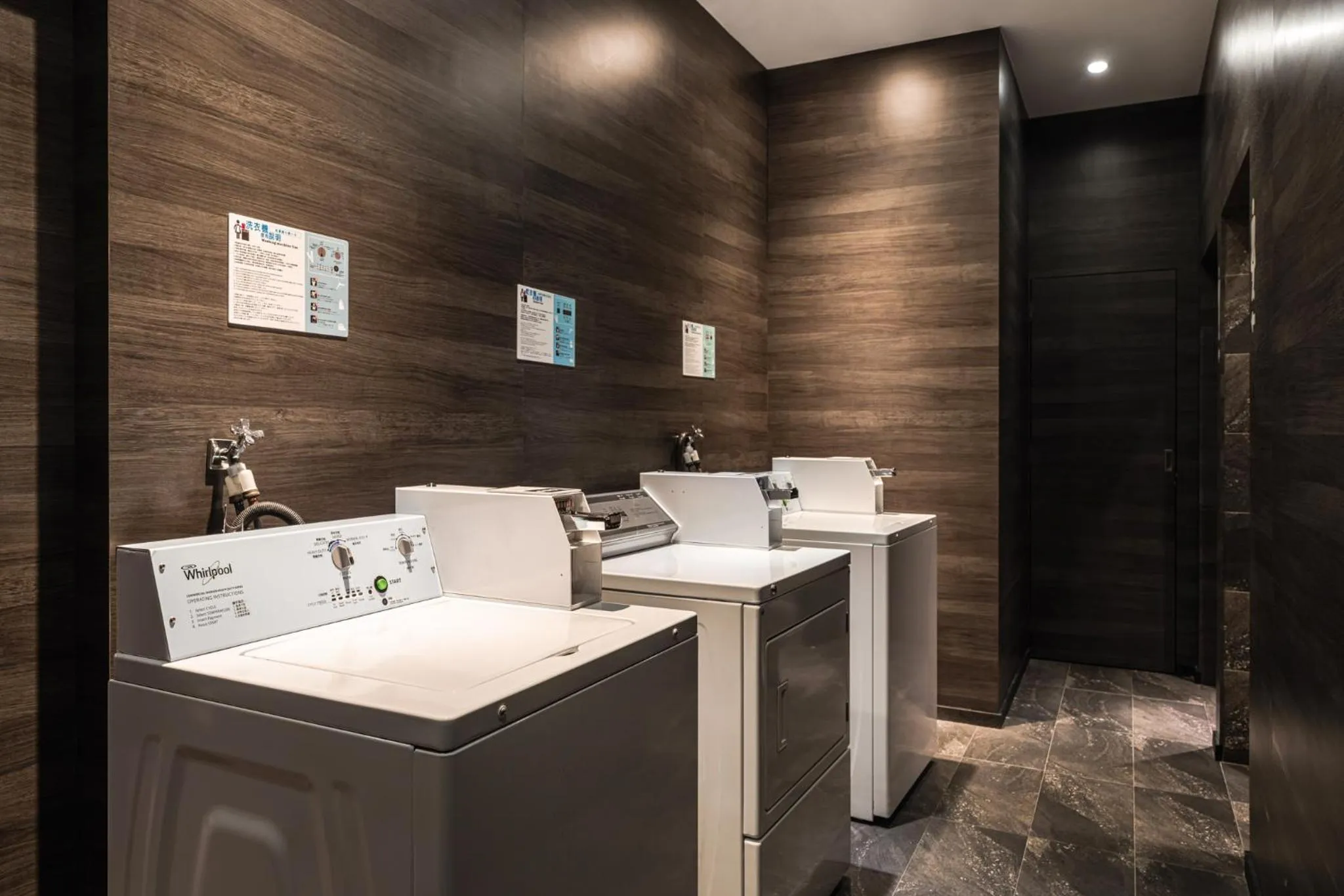 washing machine in The Riverside Hotel International