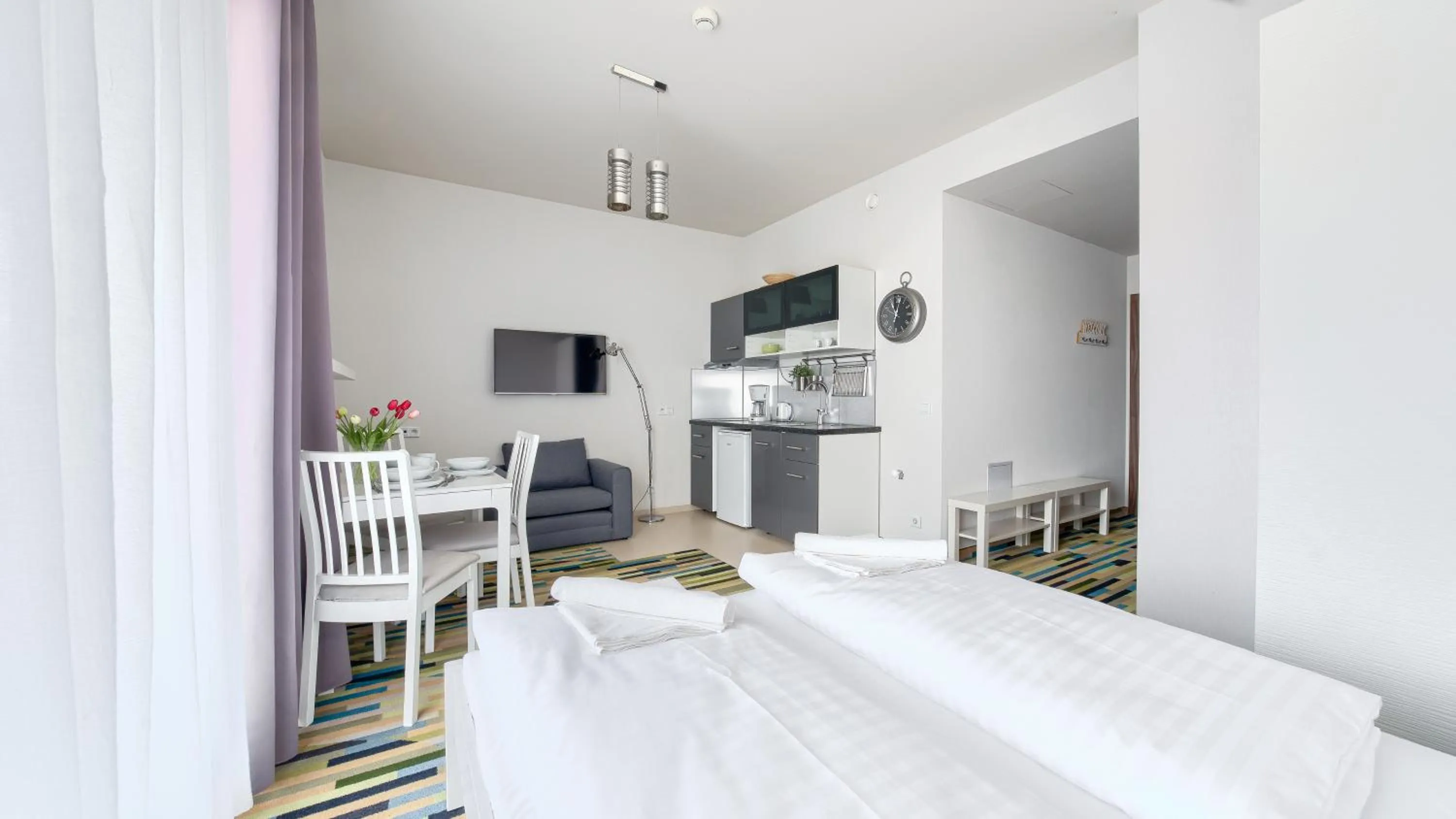 Kitchen or kitchenette, Bed in Baltic Park Molo, Sun & Snow