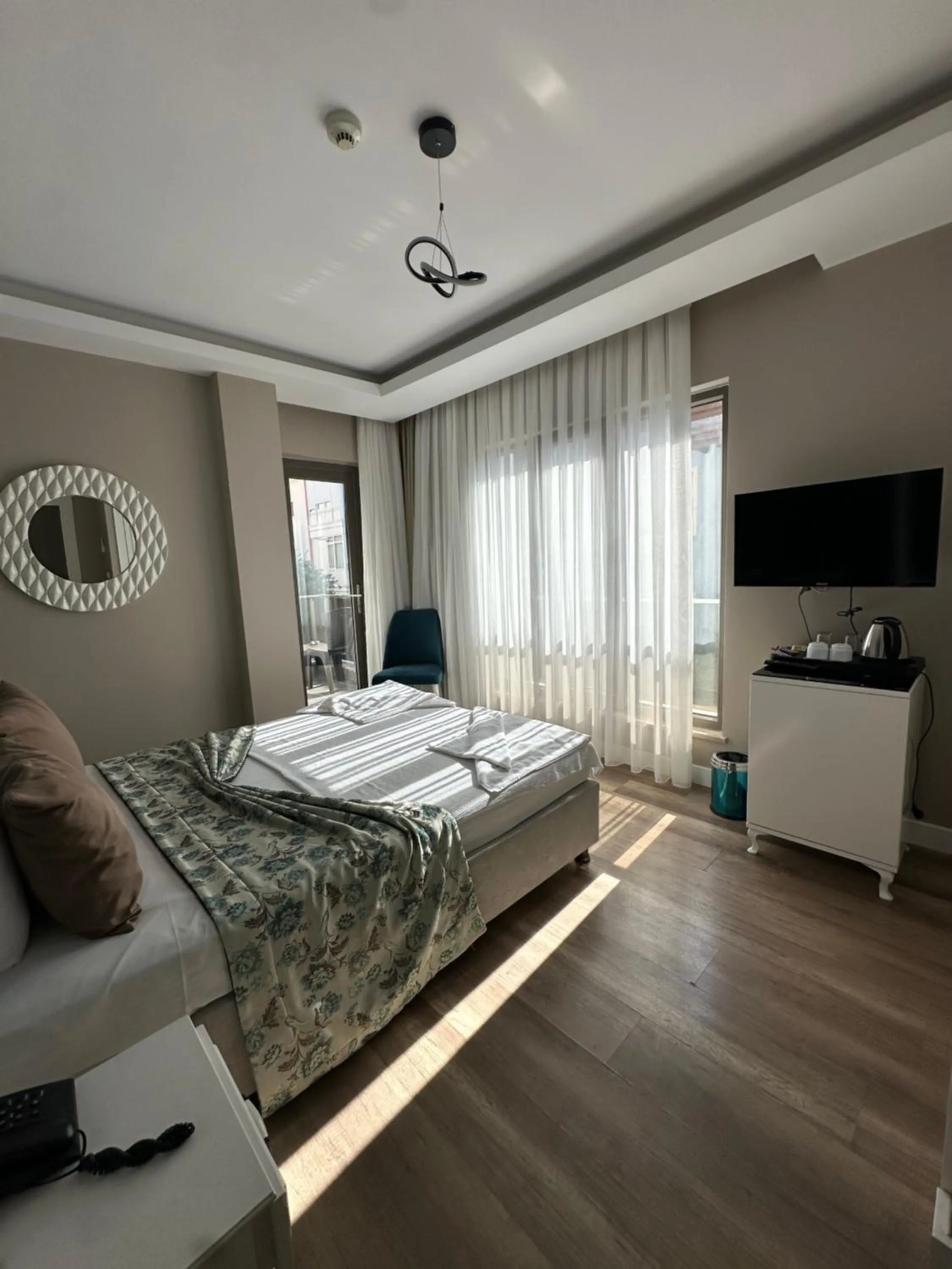 Photo of the whole room, Bed in Microyal Hotel