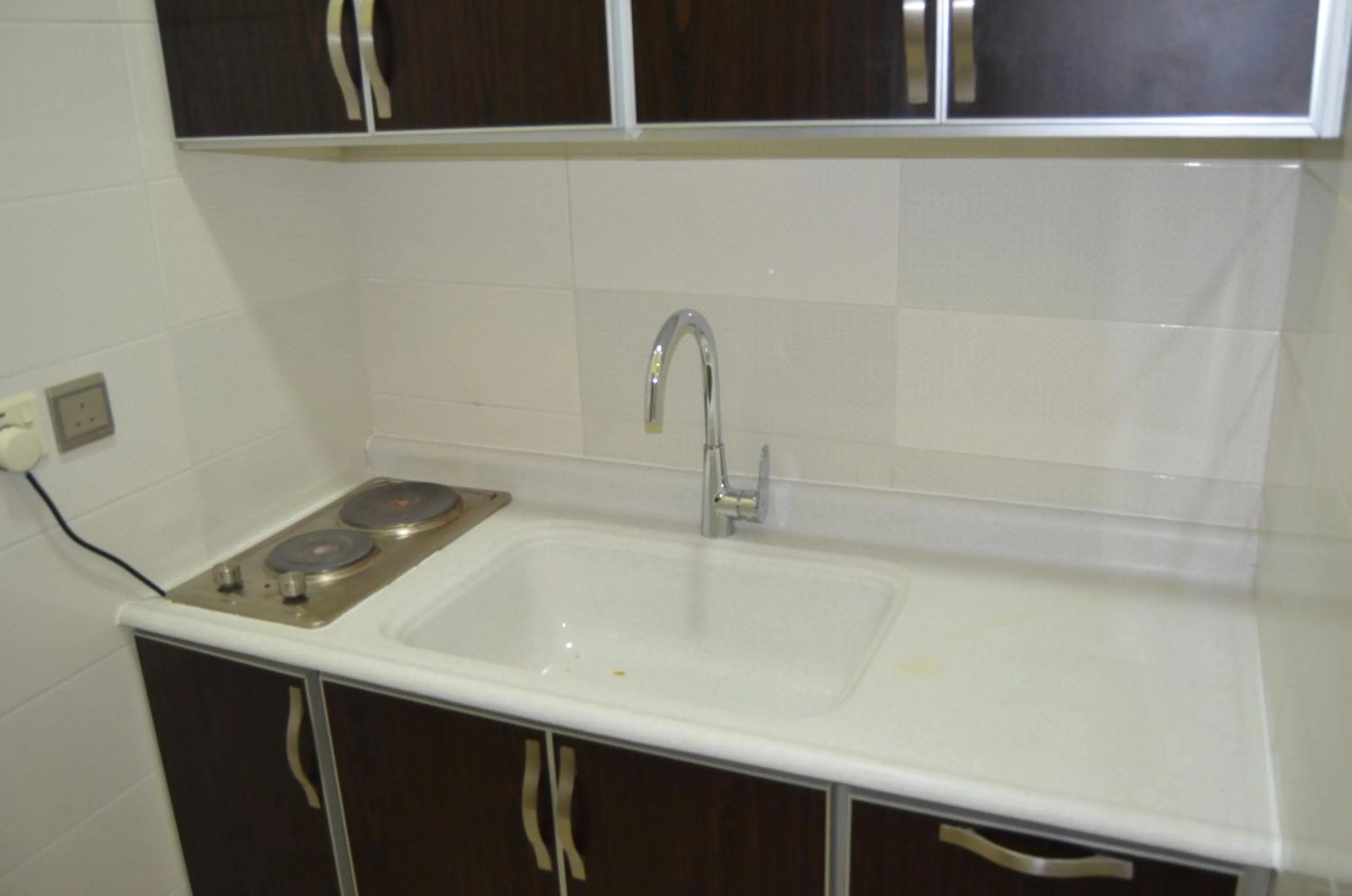Kitchen or kitchenette in Aros Al Faisaliah Furnished Units